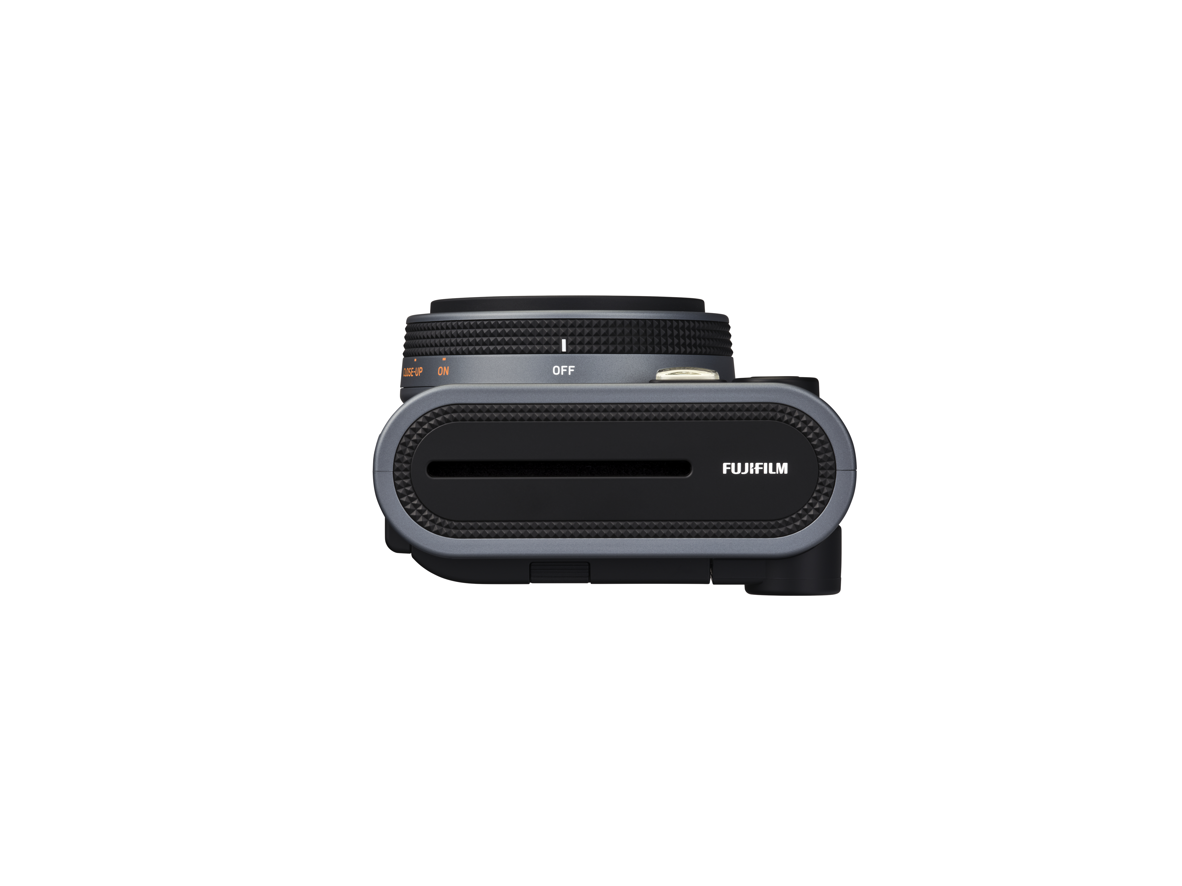 Eine graue Kamera mit schwarzem Objektiv und Fujifilm-Logo auf weißem Hintergrund.