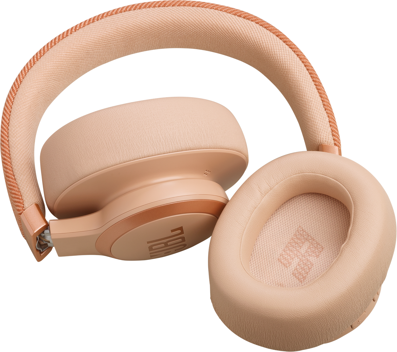 Casque JBL couleur blush sur fond noir. Les écouteurs et l'arceau montrent un design moderne.