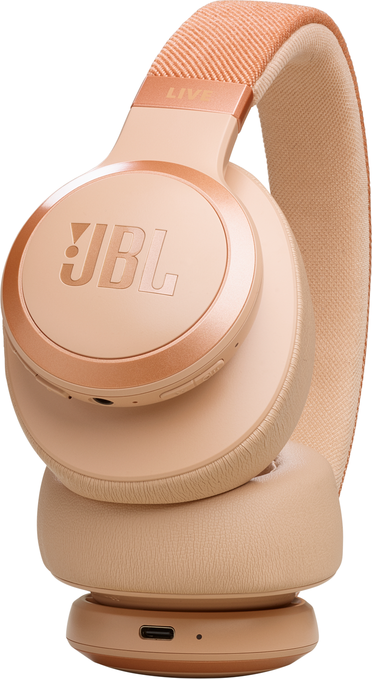 Casque JBL Live, couleurs beige et or rose. Écouteurs, bandeau et coussinets visibles.