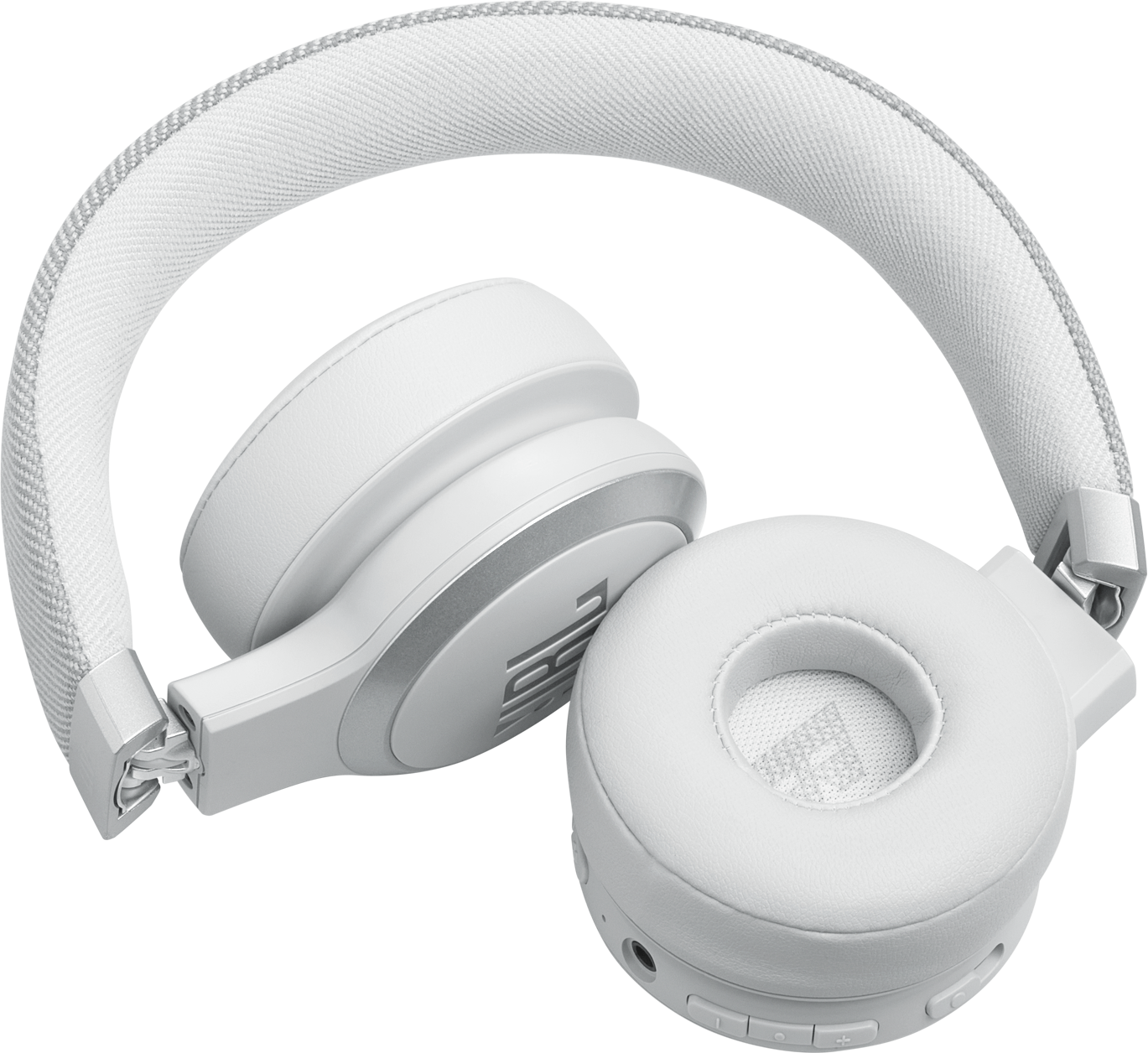Casque JBL blanc sur une surface noire, montrant les écouteurs et l'arceau.