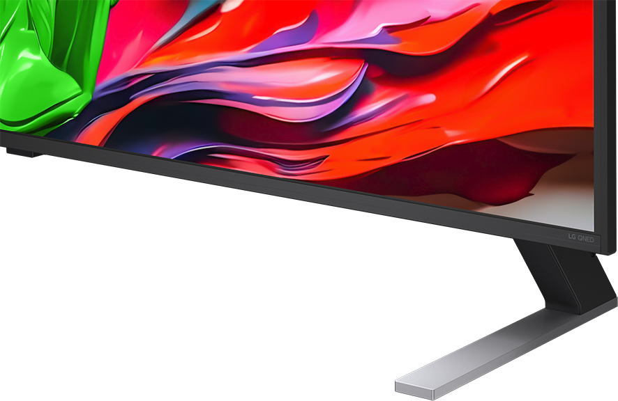Egy LG TV-állvány közeli képe sötét háttér előtt.