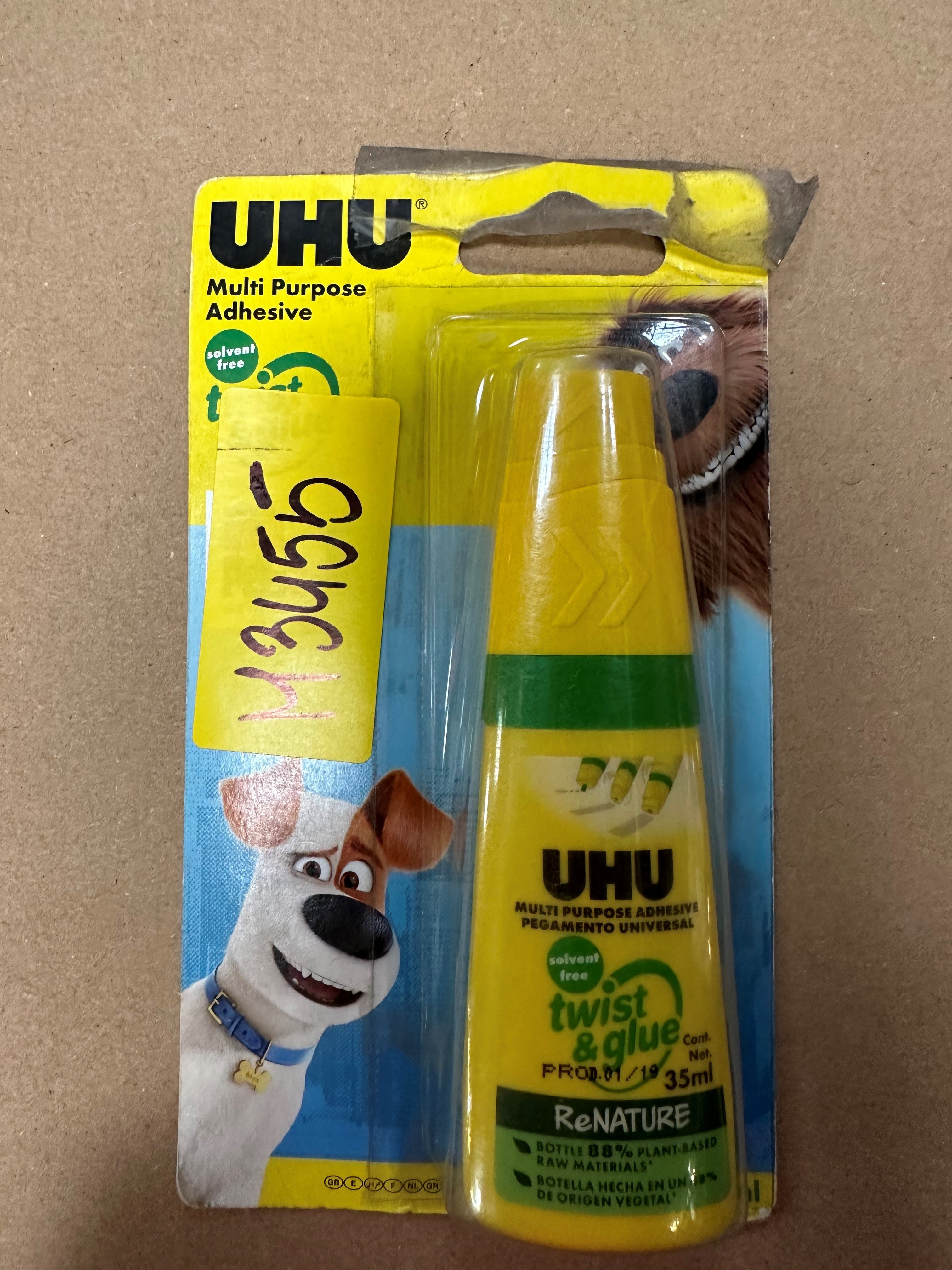 Tubka kleju uniwersalnego UHU z postacią z kreskówki.
