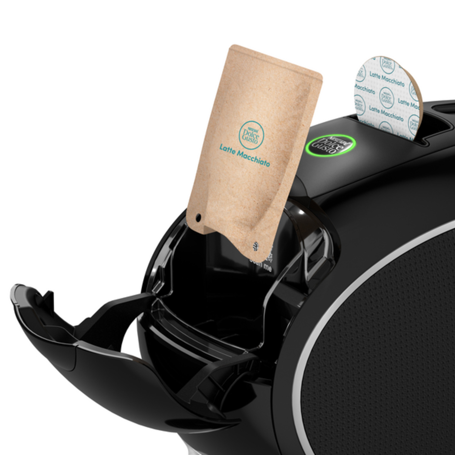 Een zwarte Dolce Gusto koffiemachine met een Latte Macchiato pod en een verpakking. De pod is ingevoegd.