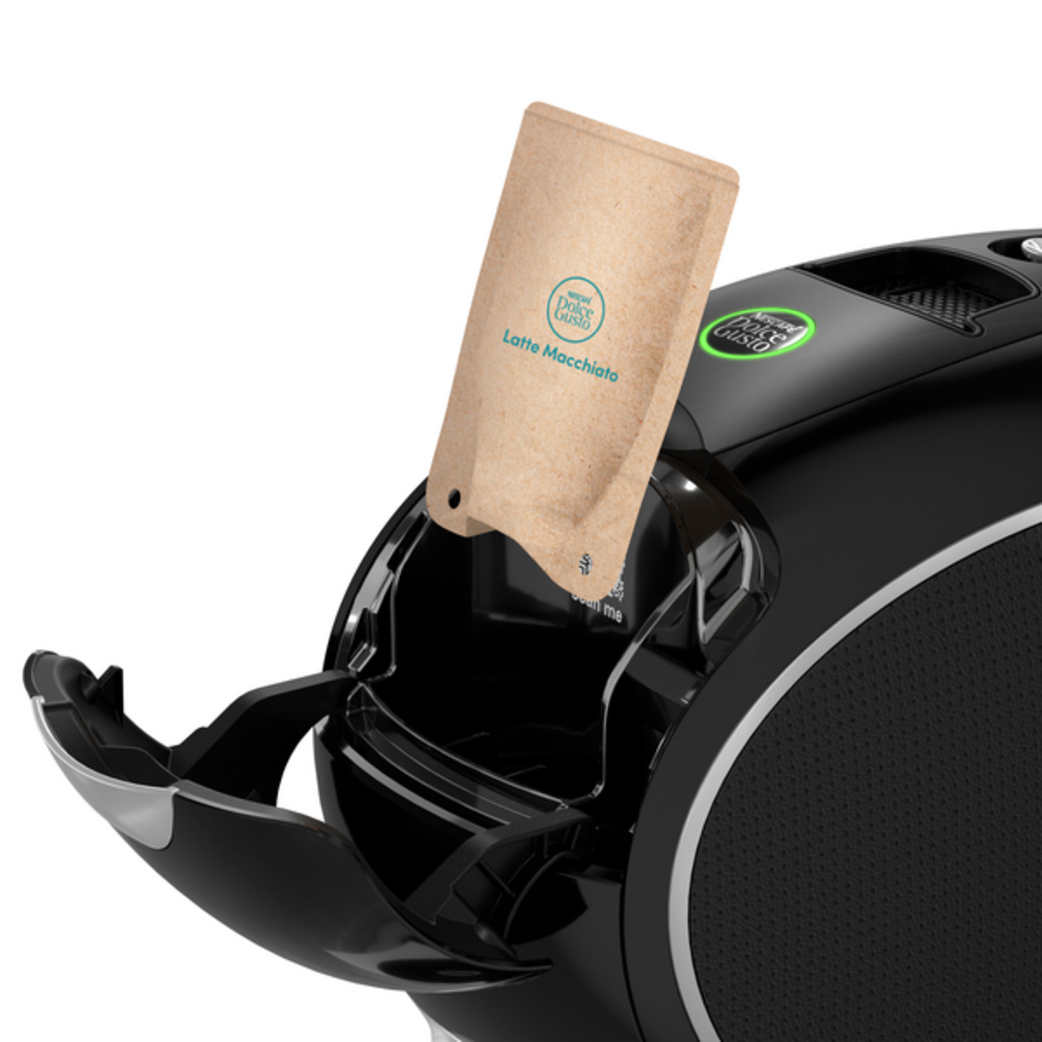 Een Dolce Gusto koffiemachine met een Latte Macchiato capsule die wordt ingevoegd. De machine is zwart en de capsule beige.