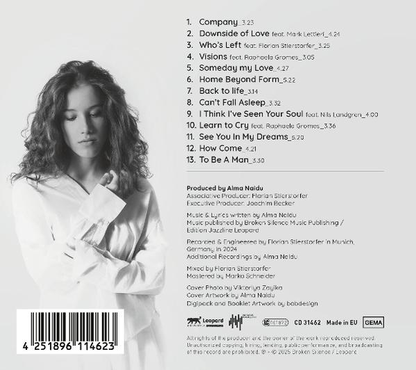 Albumcover mit einer Frau, die nach unten schaut. Text listet Songtitel und Credits auf. Barcode unten.