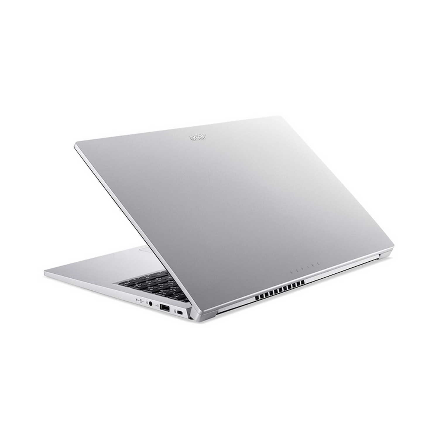 Un portátil plateado sobre una superficie blanca. La tapa está abierta, mostrando el teclado y la pantalla.