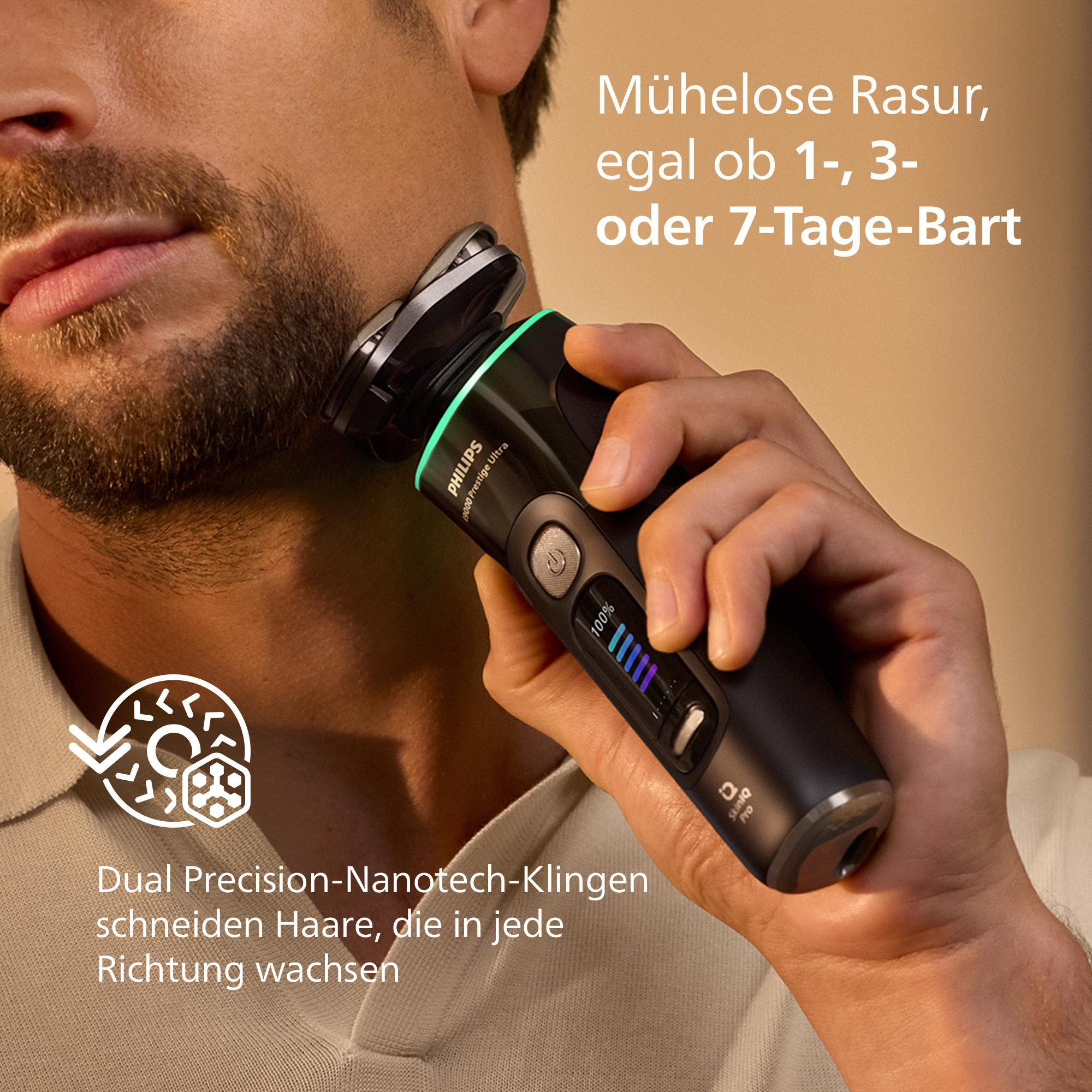 Mann rasiert sich mit einem schwarzen und grünen Elektrorasierer. Text: Mühelose Rasur für 1-, 3- oder 7-Tage-Bärte.