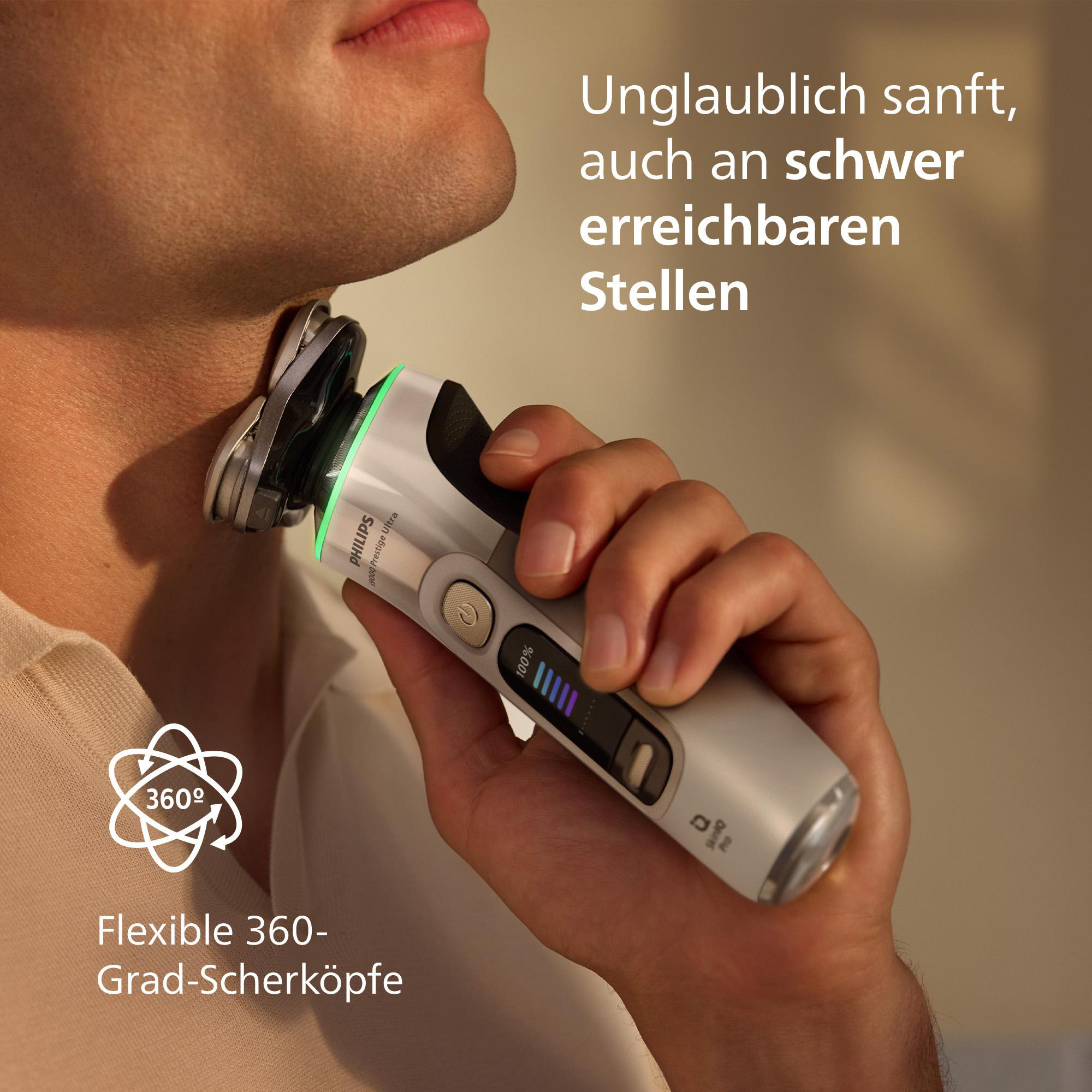 Ein Mann rasiert sich den Hals mit einem elektrischen Philips-Rasierer. Text: „Unglaublich sanft...“