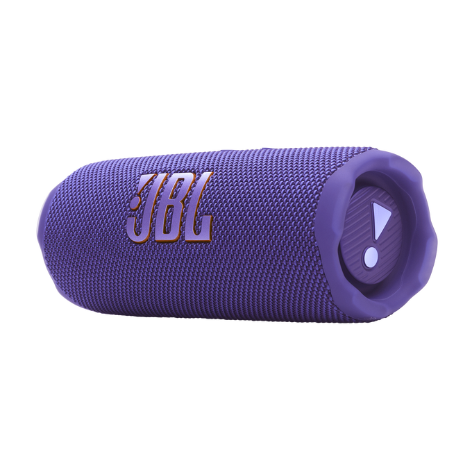Altavoz JBL morado con el logo sobre fondo negro. El altavoz está enfocado.