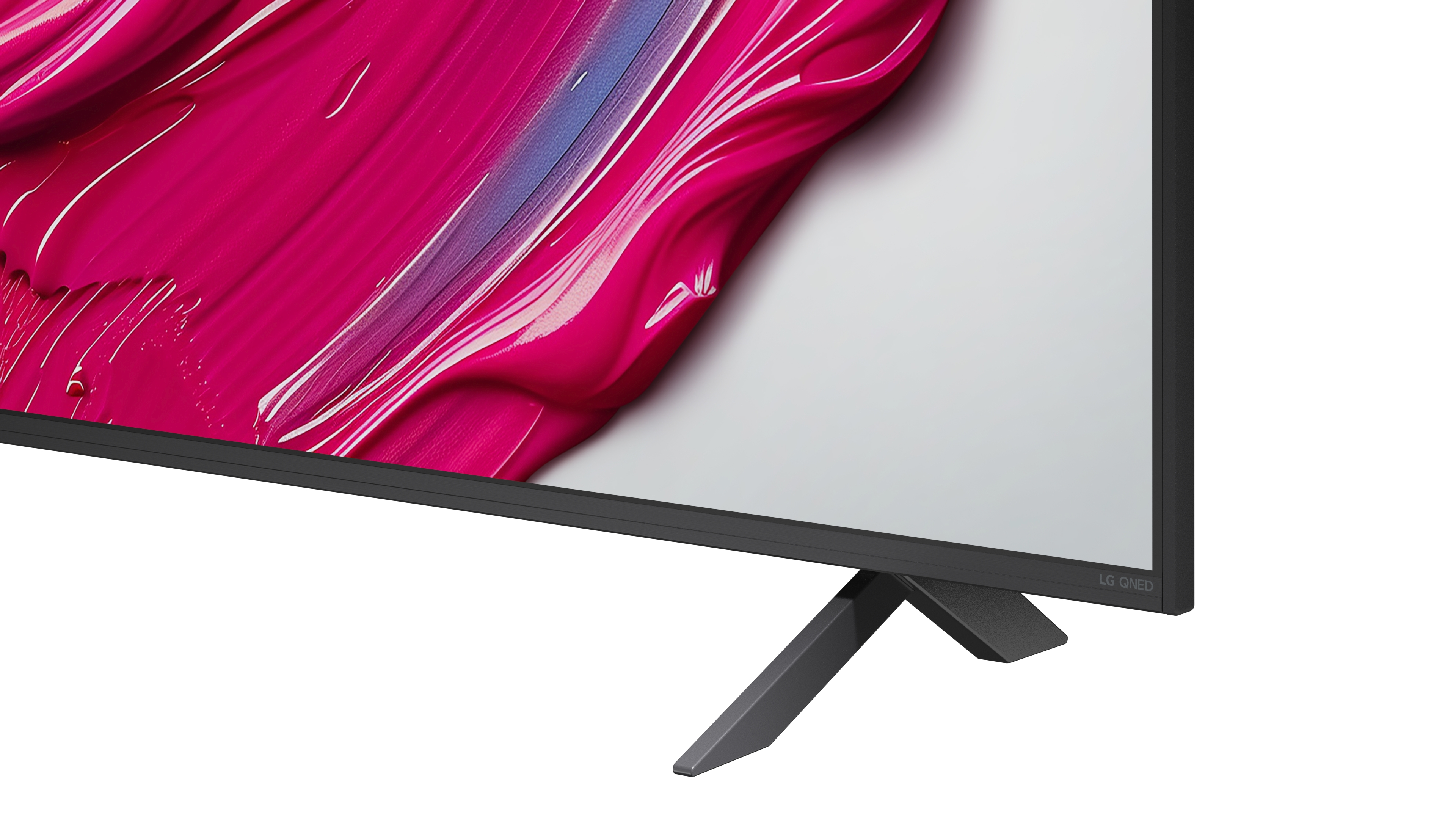Nahaufnahme eines Fernsehers mit schwarzem Rahmen und Ständer, der einen Farbfleck zeigt.