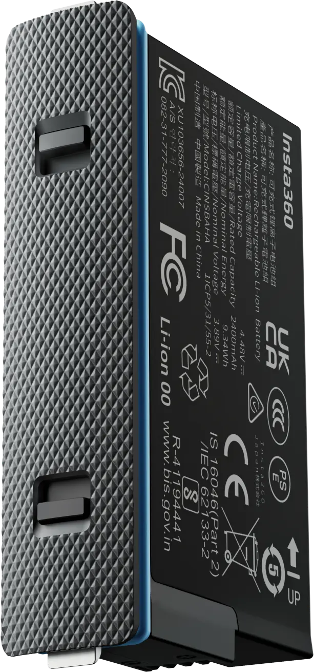 Batterie de caméra Insta360, noire et grise, avec étiquettes et marquages.