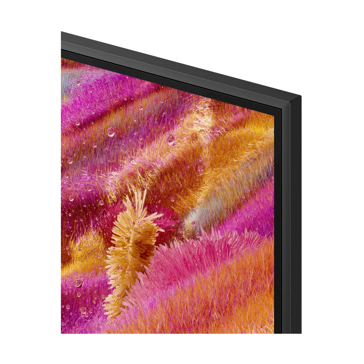 Primo piano dell'angolo dello schermo TV. Design astratto colorato con rosa, giallo e arancione.