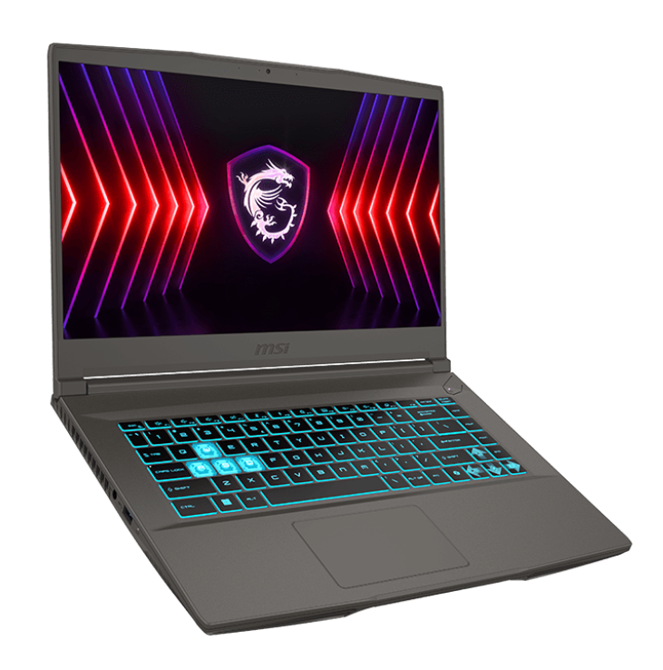 Szary laptop MSI z podświetlaną klawiaturą, pokazujący logo na ekranie. Czarne tło.