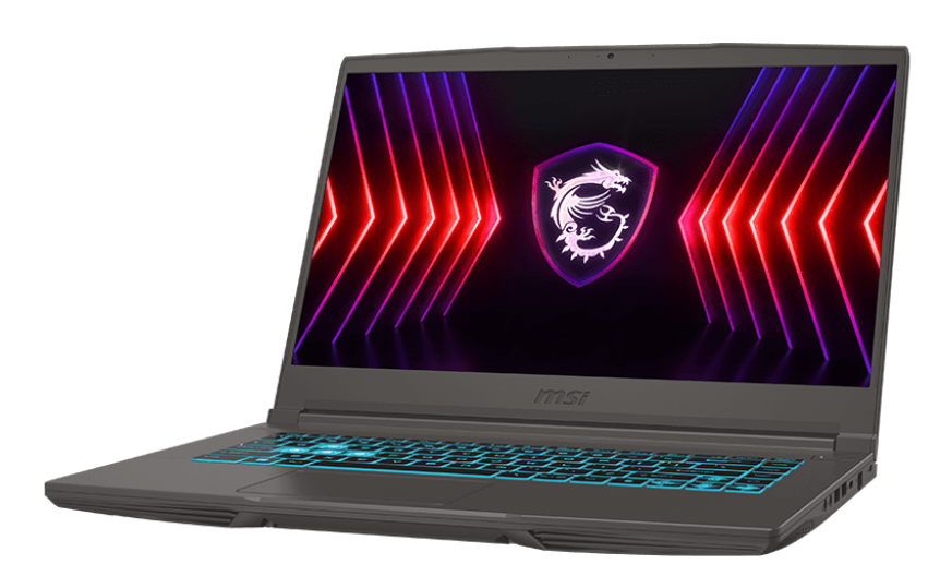 Szary laptop do gier MSI z podświetlaną klawiaturą, wyświetlający logo smoka na ekranie.