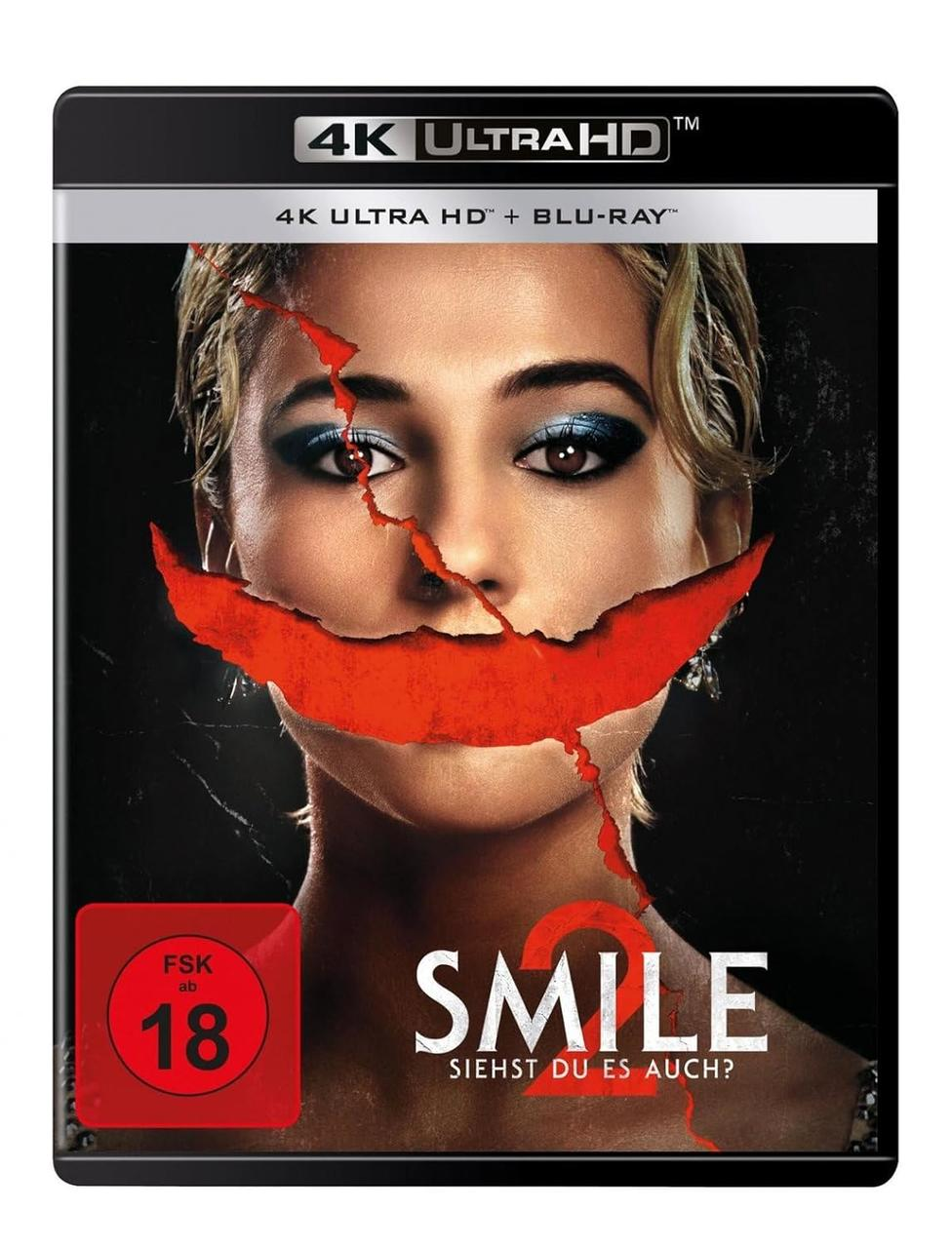 Smile 2 Blu-ray-Cover. Ein Frauengesicht mit einem roten, gezackten Lächeln. 4K Ultra HD-Logo oben.