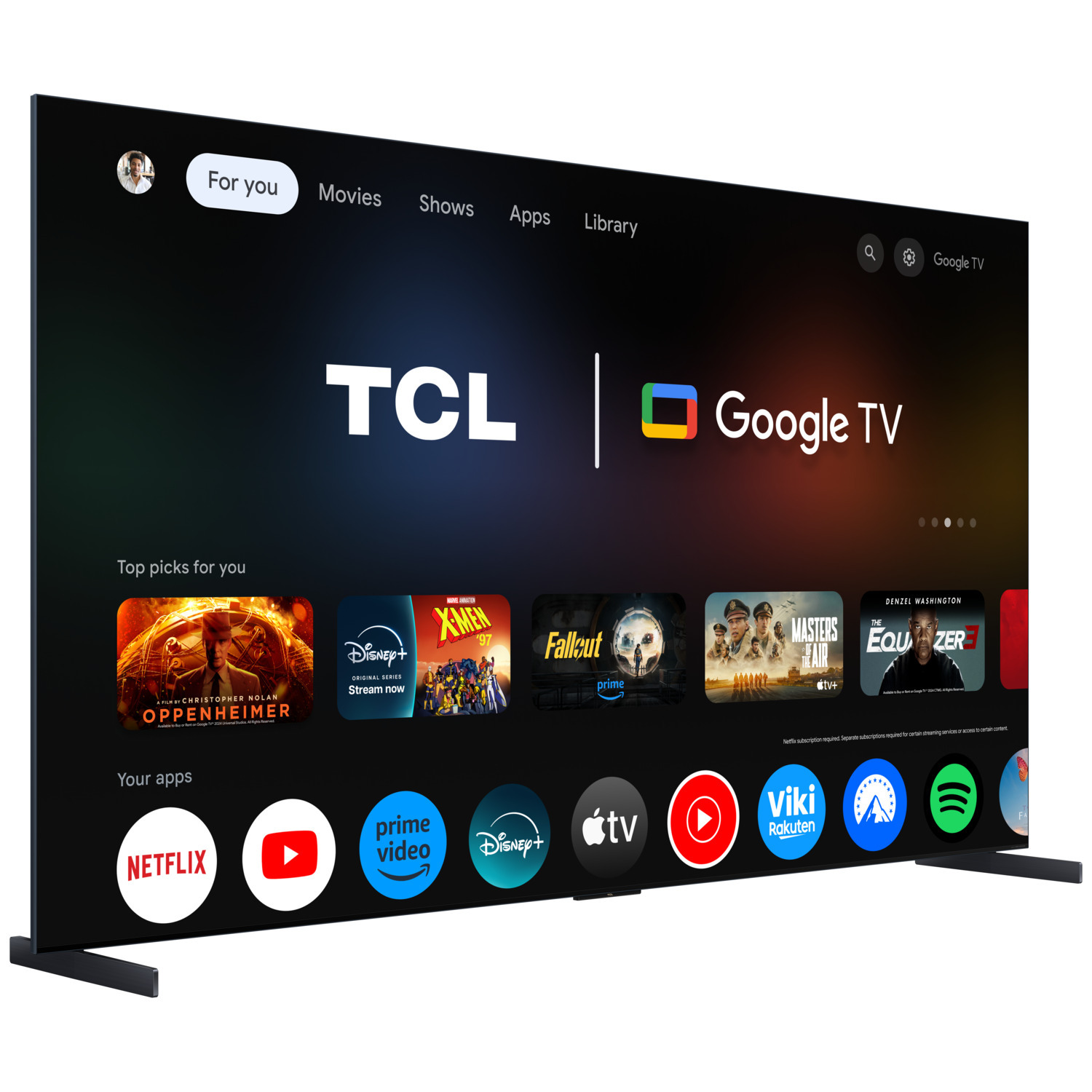 Un téléviseur TCL Google. L'écran affiche des applications et des films. Le téléviseur est noir et sur un support.