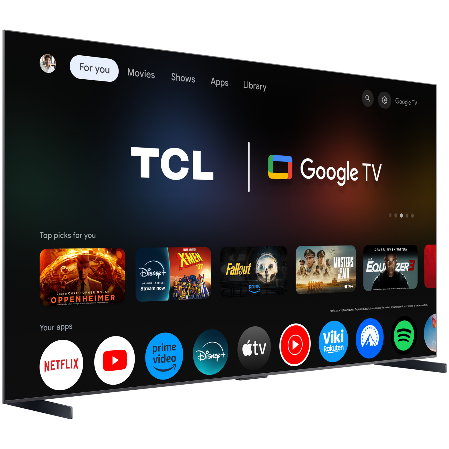 Grote TCL Google TV, met menu met apps, films en shows. Zwart frame, zilveren standaard, helder scherm.