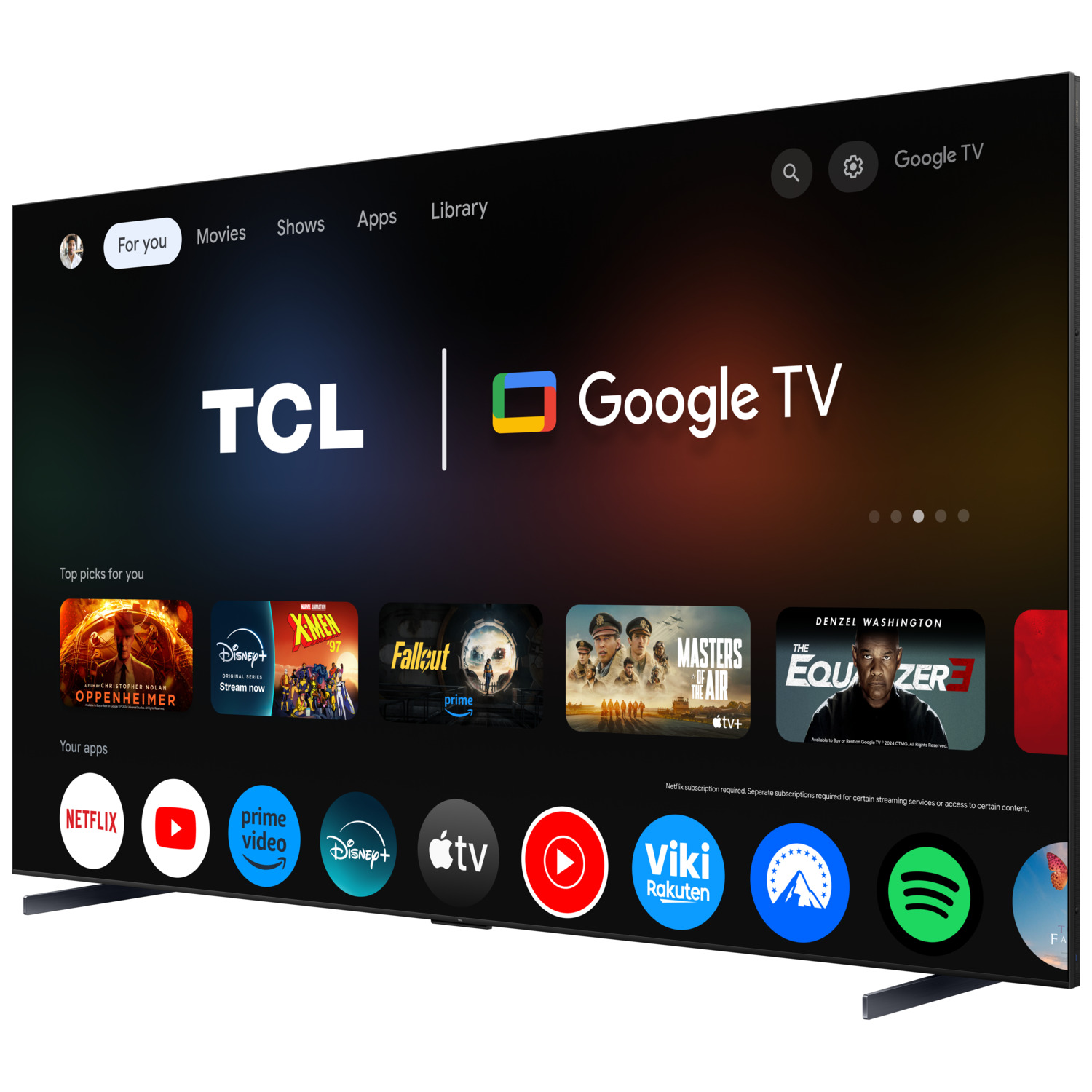 Un grand téléviseur TCL Google affiche diverses applications, films et émissions de télévision sur fond sombre.