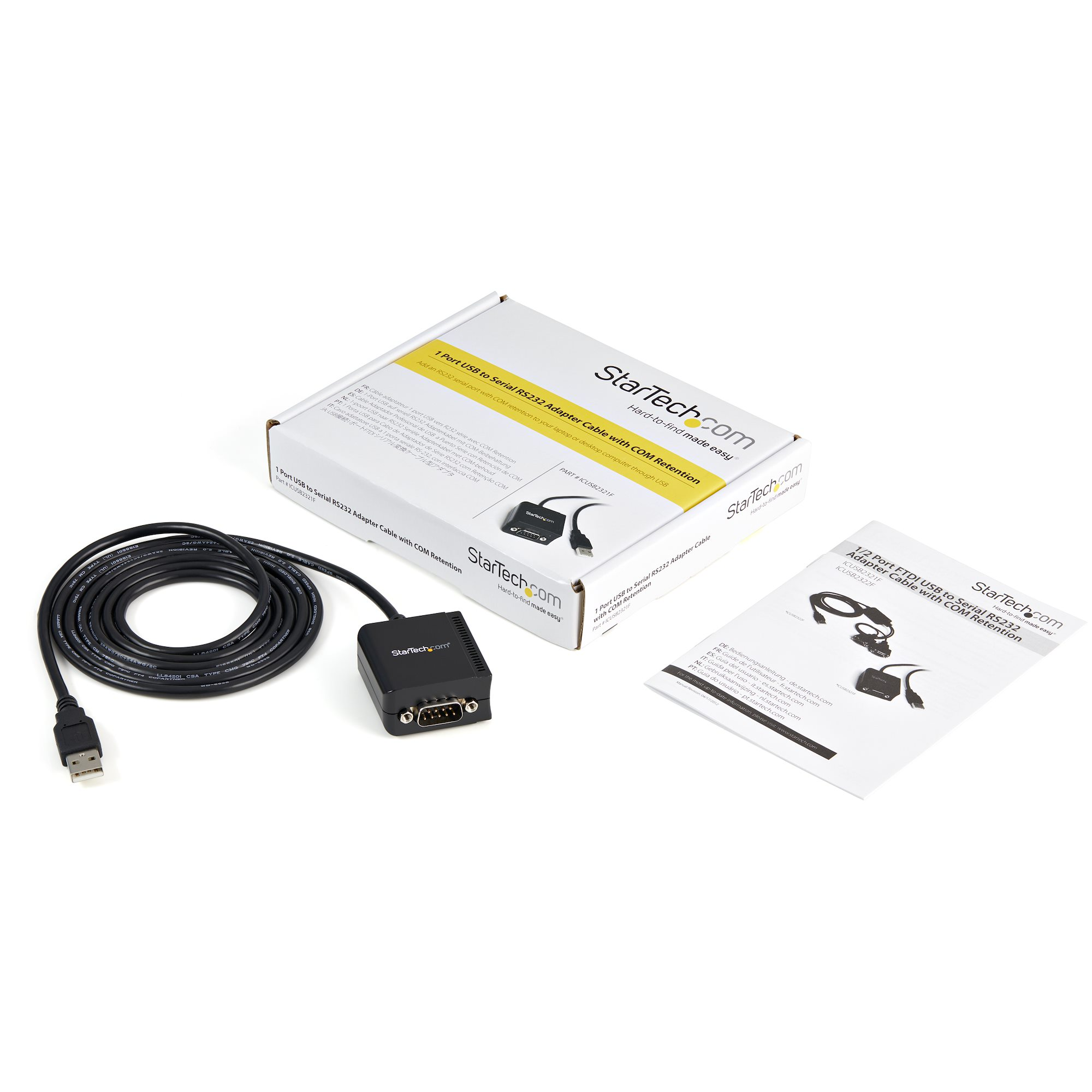 Egy USB-soros adapterkészlet fekete kábellel, adapterrel, dobozzal és kézikönyvvel fehér felületen.
