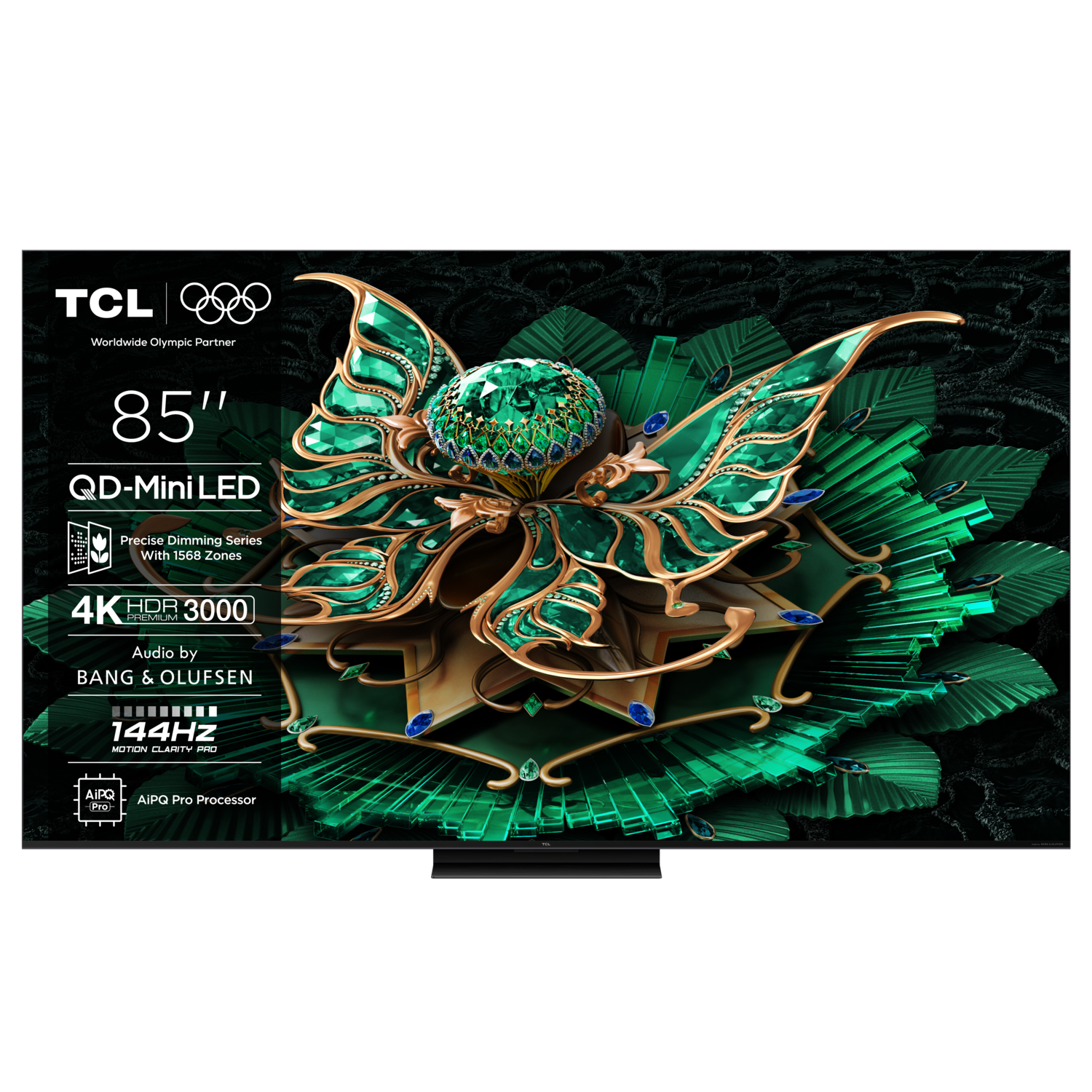 Large TV screen with a complex design in green, gold and blue, with text. Black stand.