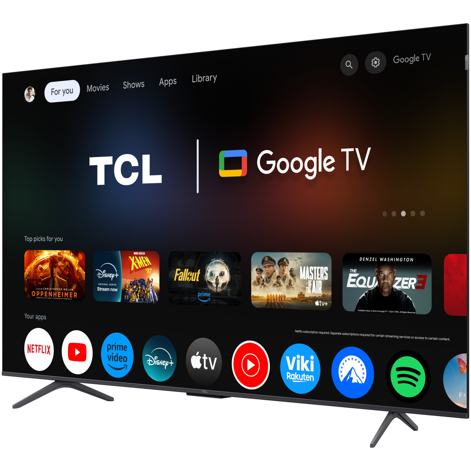 A TCL Google TV, showing its home screen with app icons and previews, on a black stand.