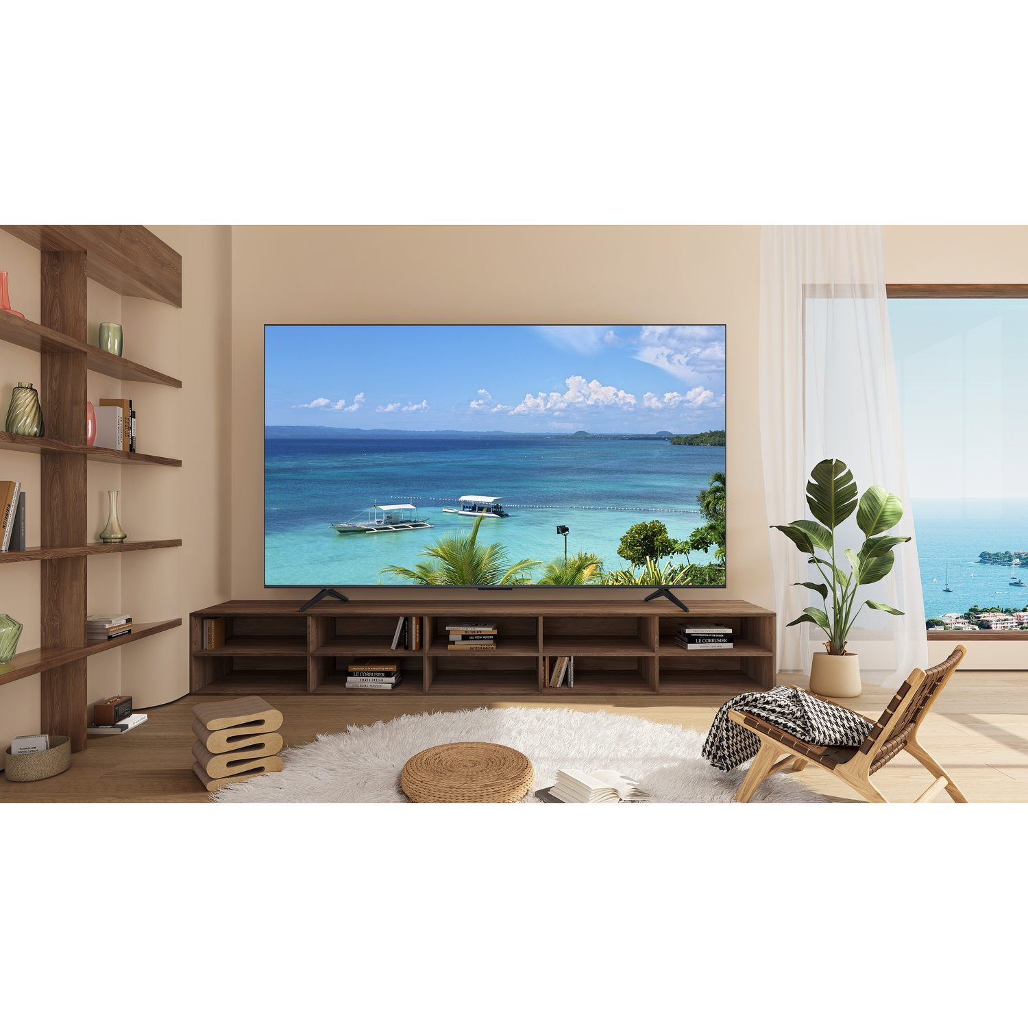 A large TV showing a beach scene, placed on a brown stand with shelves.