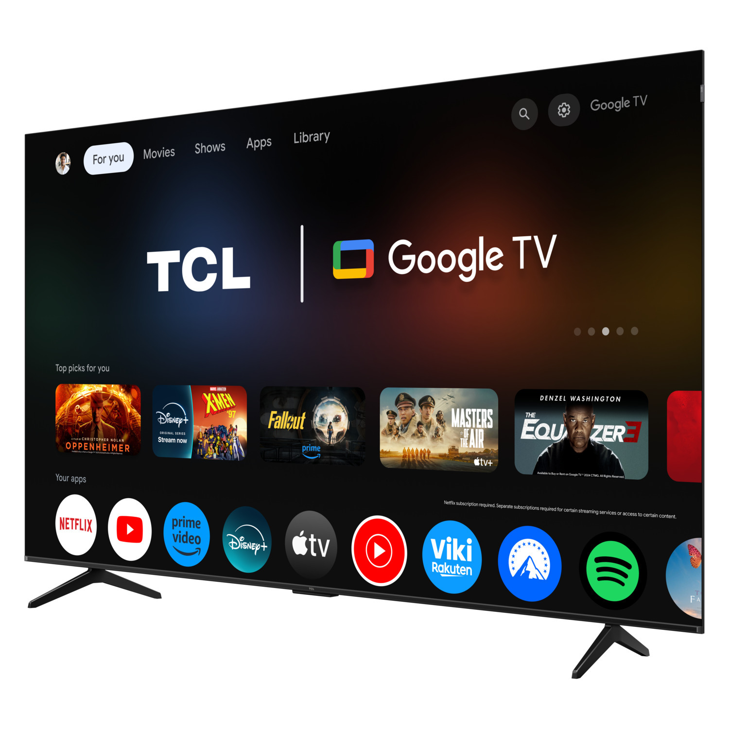 A large TCL Google TV with the main menu on screen, displaying apps.
