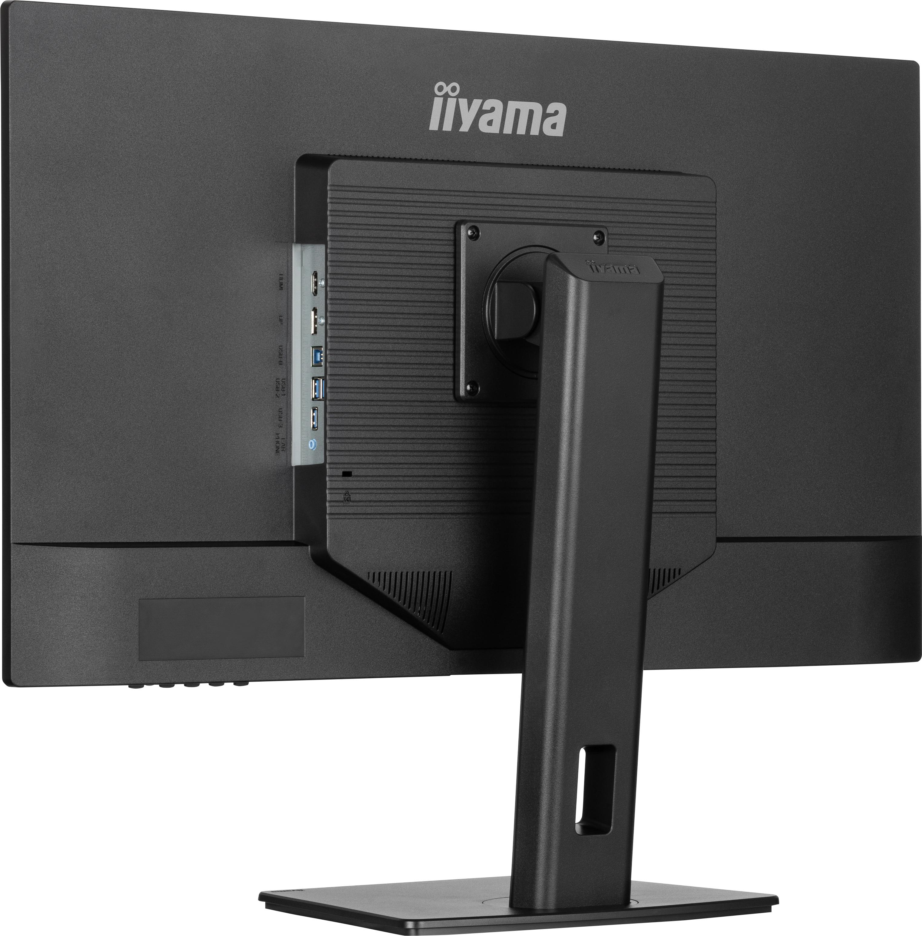 Die Rückseite eines Computermonitors mit Anschlüssen, Kabeln und einem Ständer.