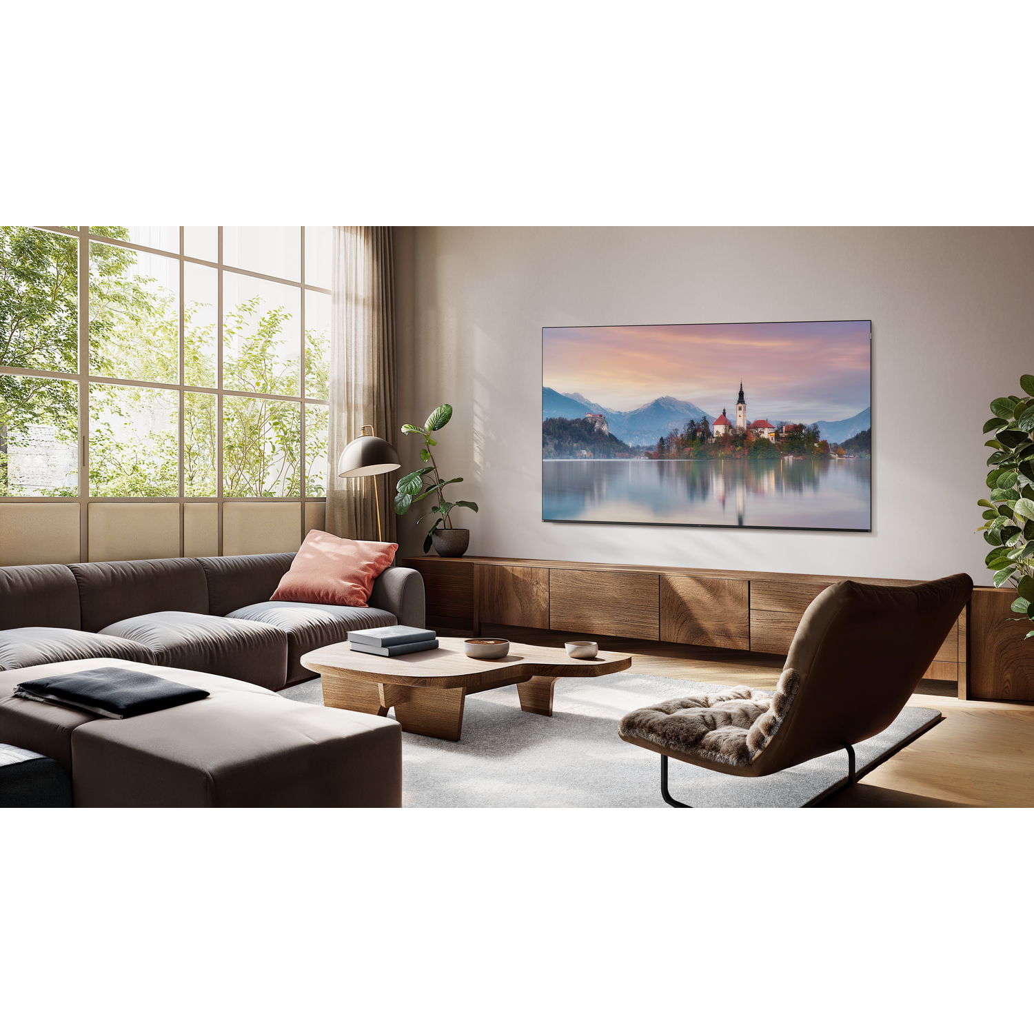 Living room with TV displaying a scenic lake view.