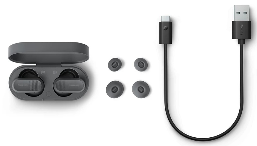 Szare słuchawki Philips, etui ładujące, dodatkowe wkładki douszne i kabel USB-C.