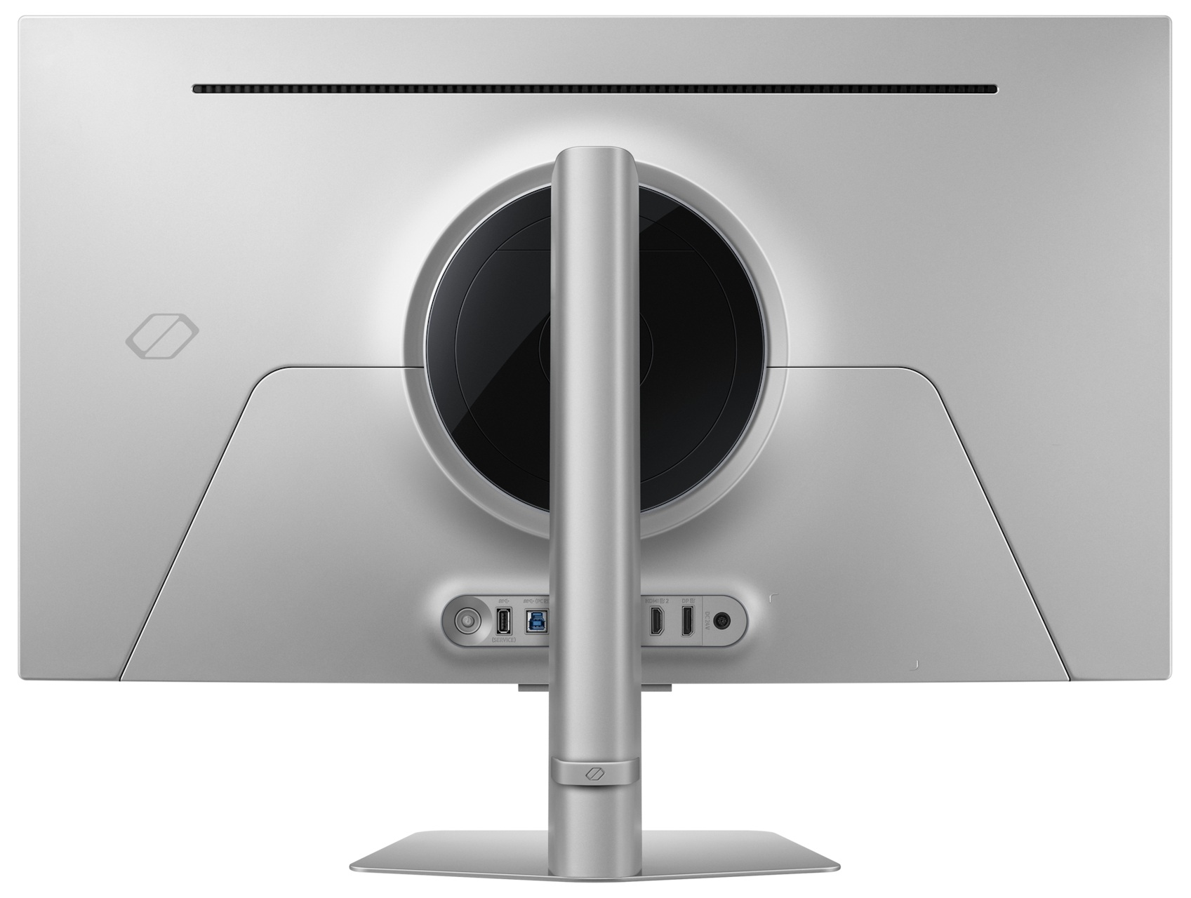 Widok z tyłu srebrnego monitora z okrągłym wzorem, podstawą i różnymi portami na dole.