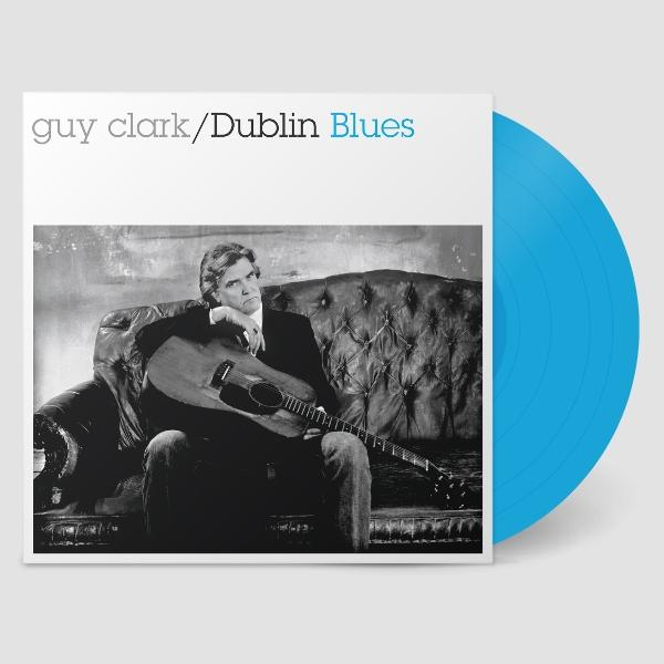 Albumcover mit einem Mann, der eine Gitarre hält. Auf der rechten Seite befindet sich eine blaue Schallplatte.
