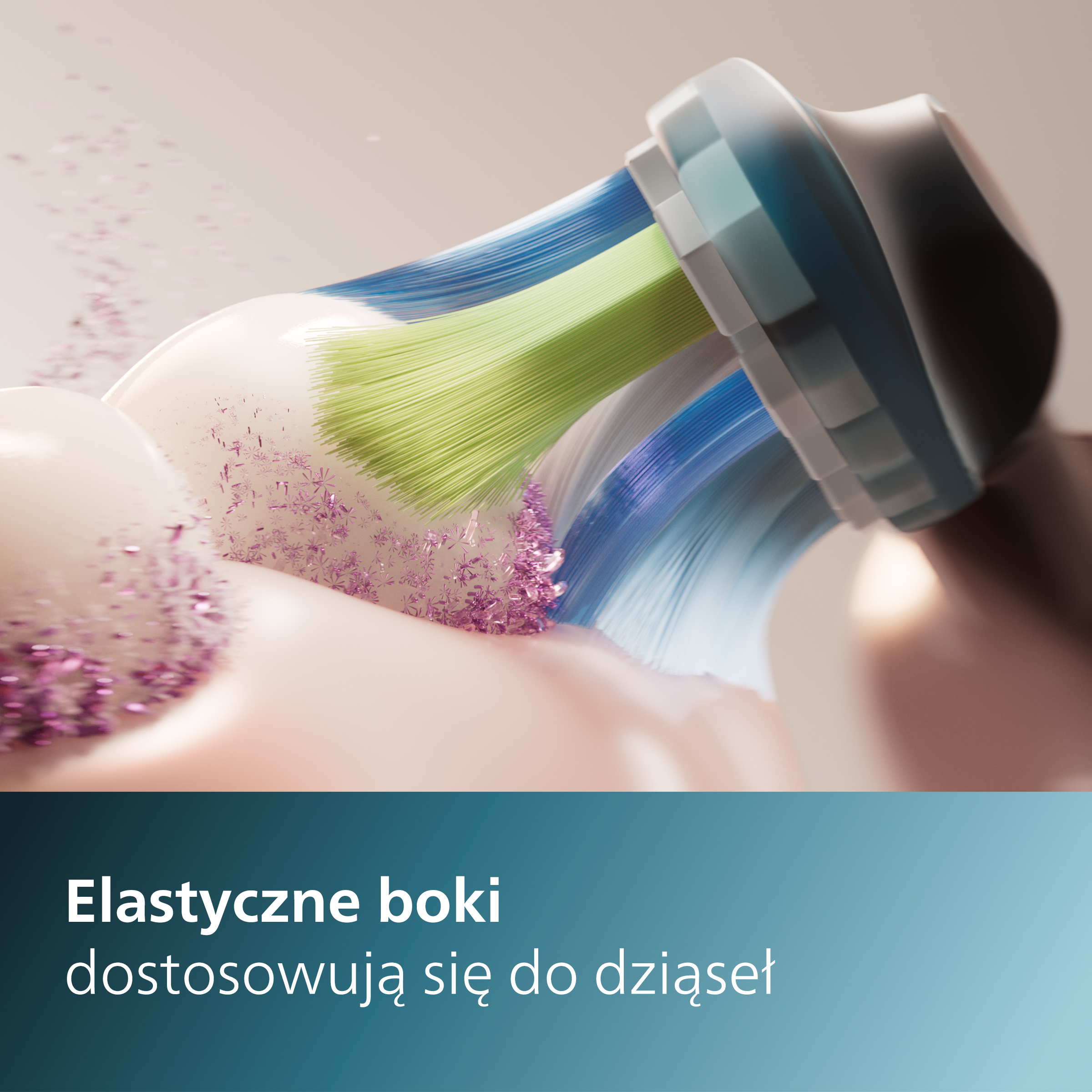 Główka szczoteczki elektrycznej z zielonym i niebieskim włosiem w użyciu.