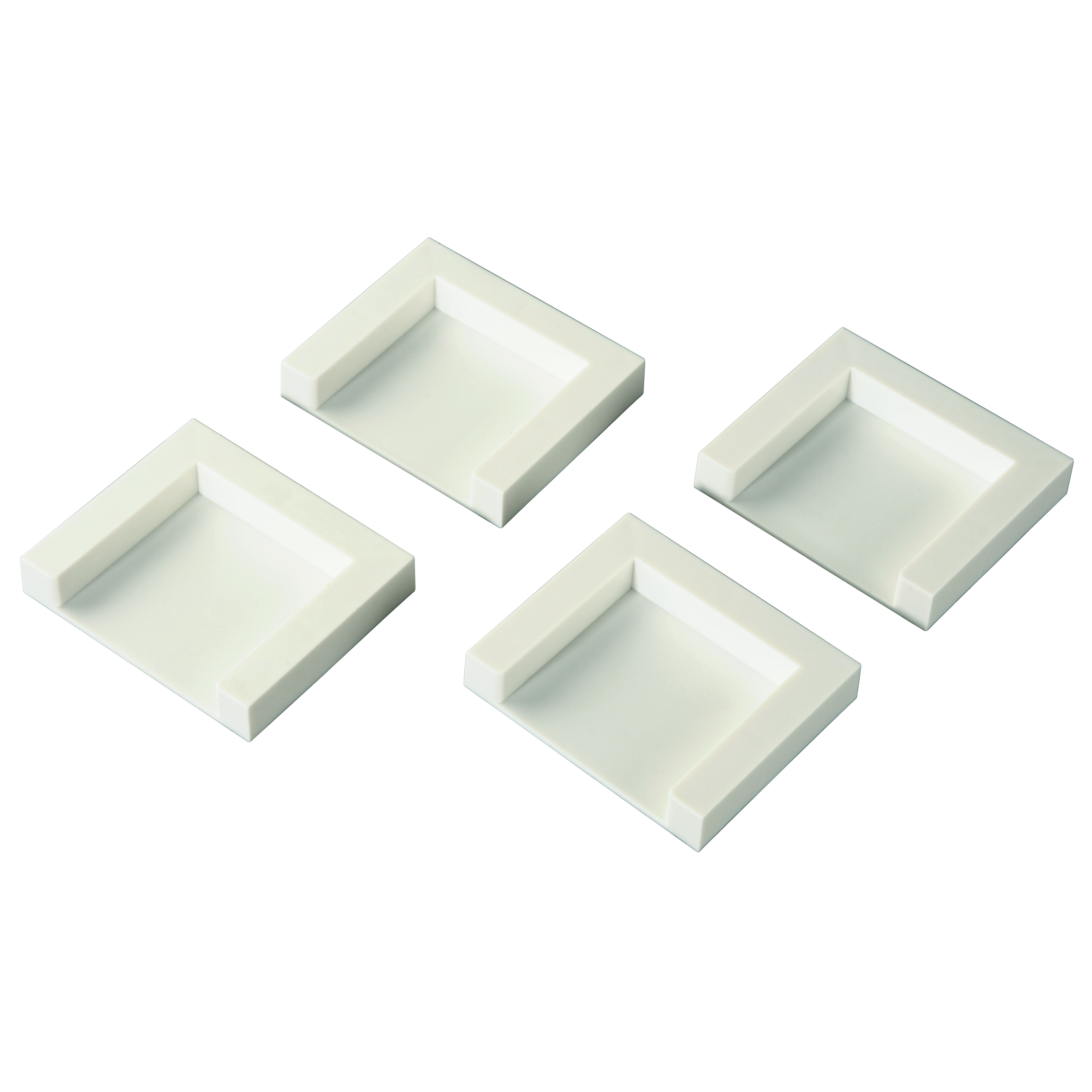 Set aus vier kleinen, weißen, quadratischen Regalen.