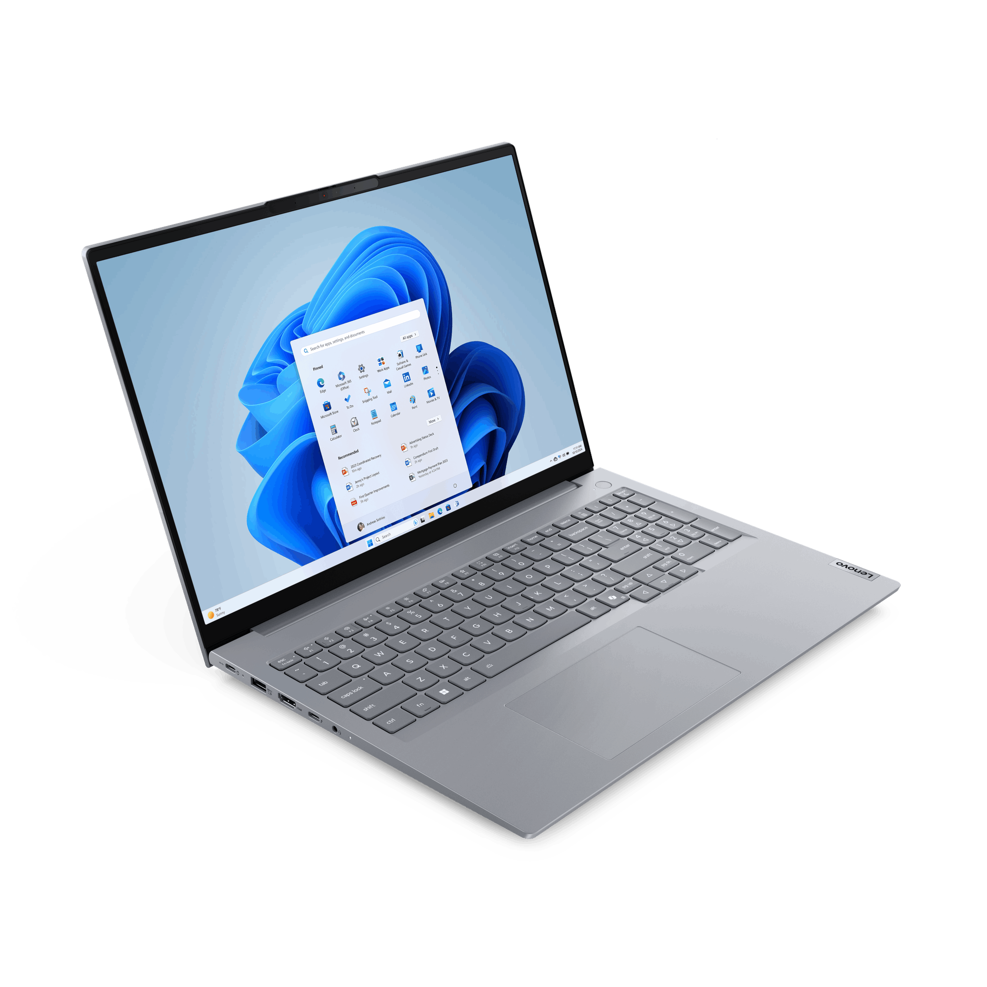 Portátil con la pantalla abierta. La pantalla muestra una interfaz de Windows 11. El portátil está en ángulo.