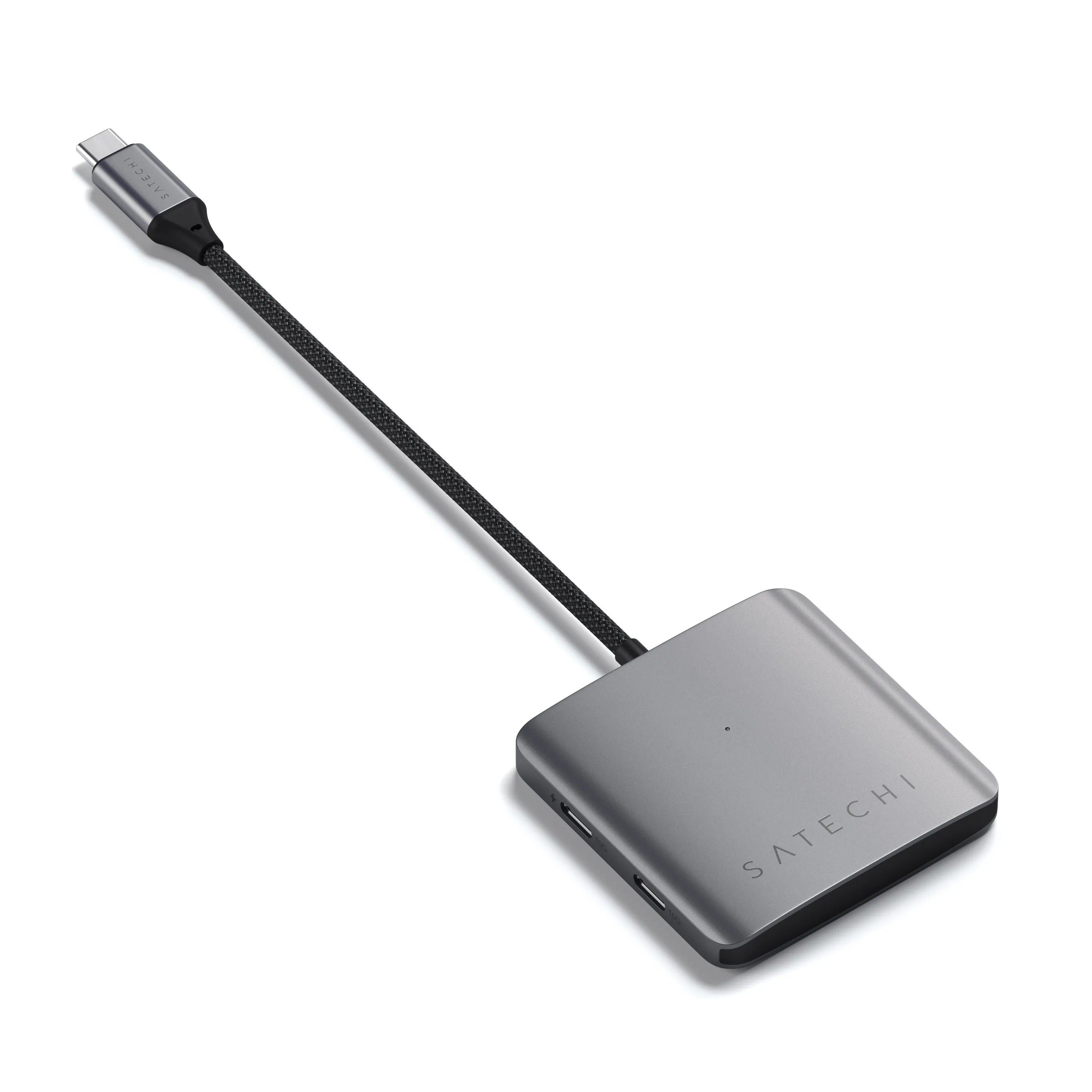 Ein silberner Satechi USB-C-Hub mit einem schwarzen Kabel.