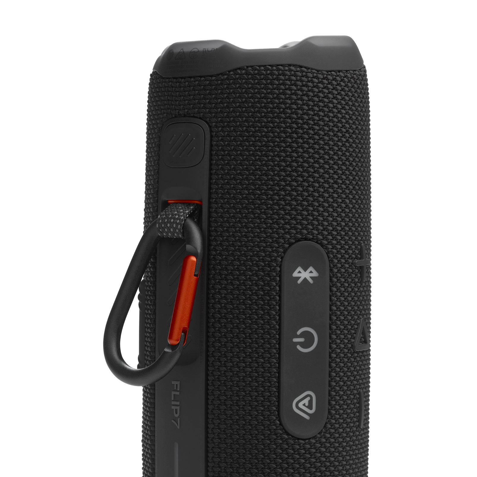 Siyah JBL Flip 7 hoparlör. Düğmeleri ve kırmızı bir karabina klipsi var.