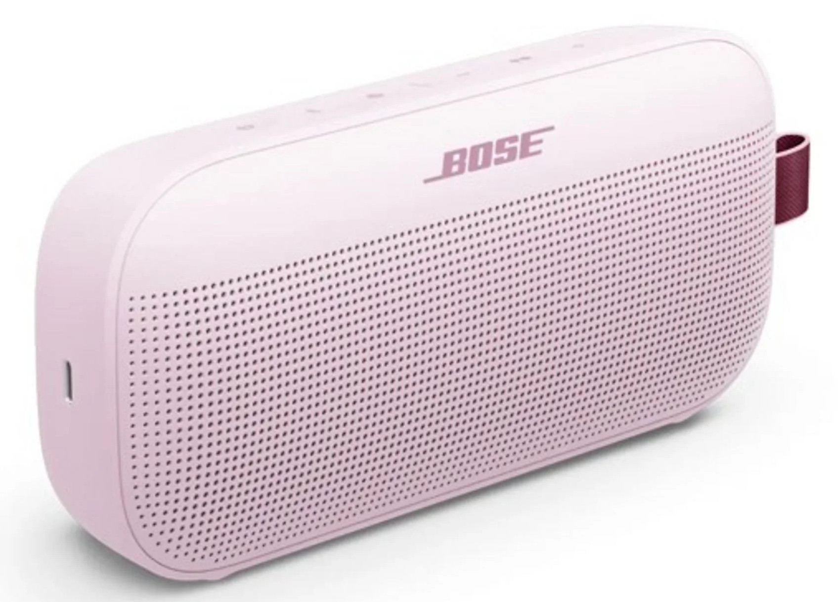Różowy głośnik przenośny Bose z przyciskami i bordowym paskiem.