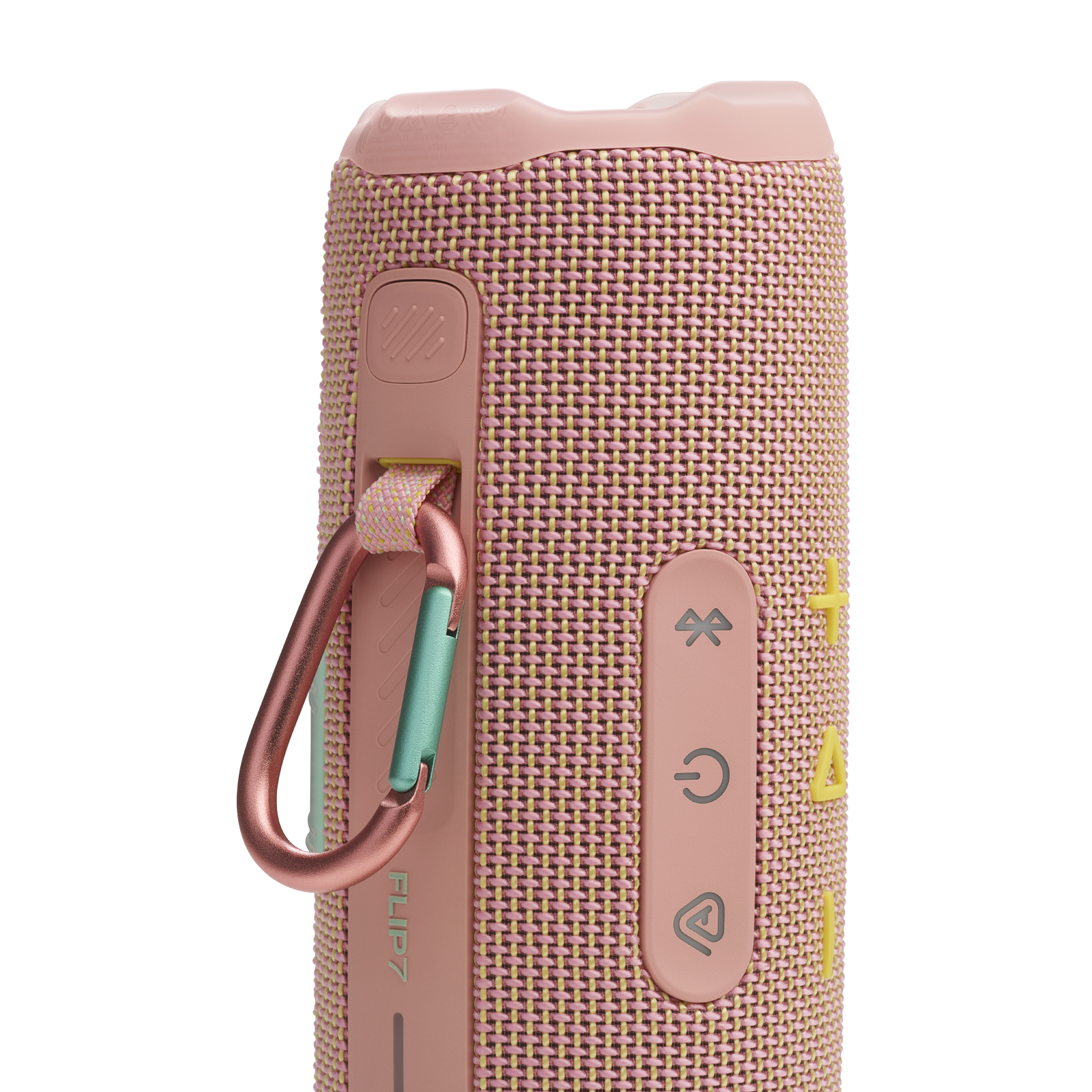 Pembe JBL Flip 7 hoparlörün yakın çekimi, düğmeleri ve karabina beyaz arka planda.