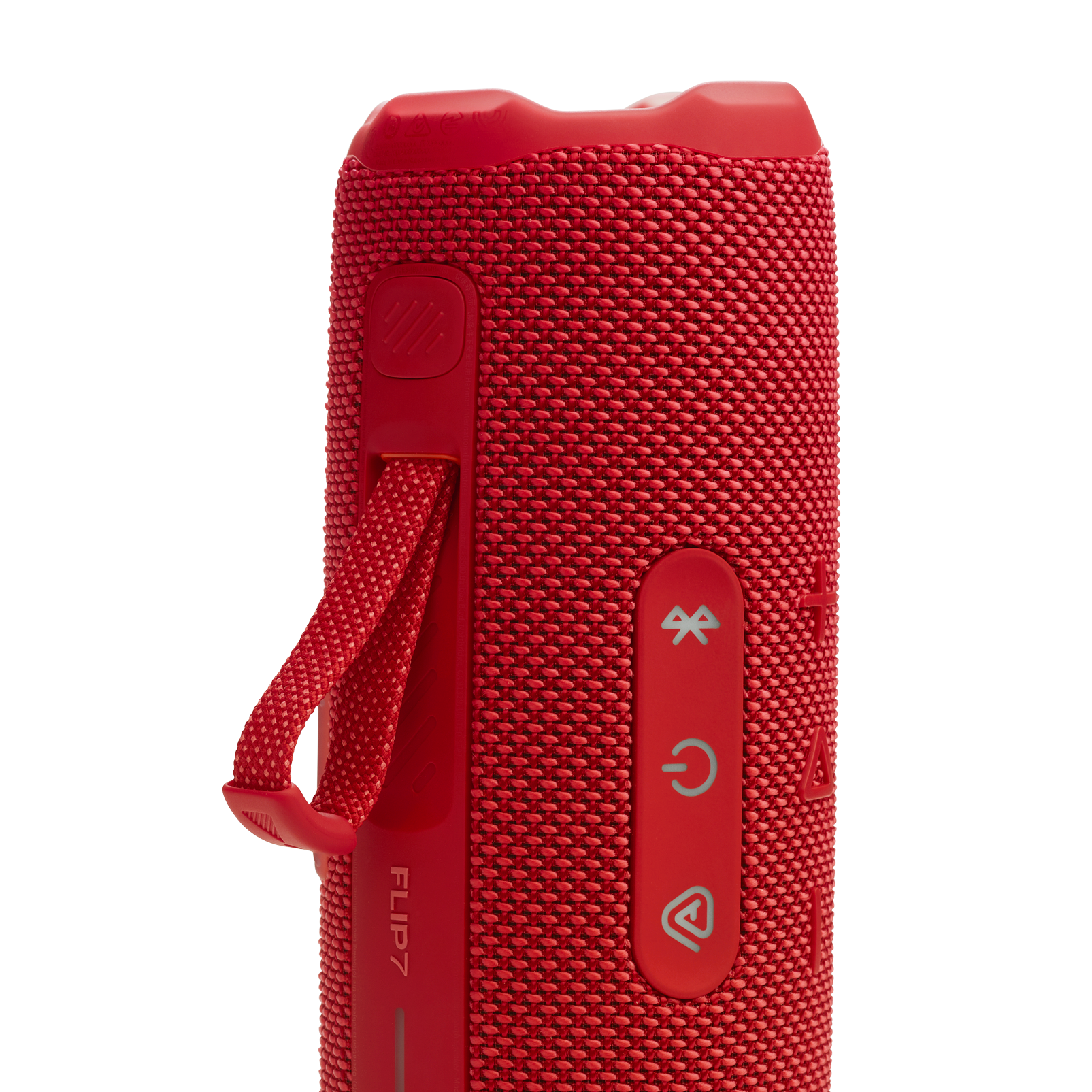 Kırmızı bir JBL Flip 7 taşınabilir hoparlör. Güç, Bluetooth ve oynatma düğmeleri görünür.