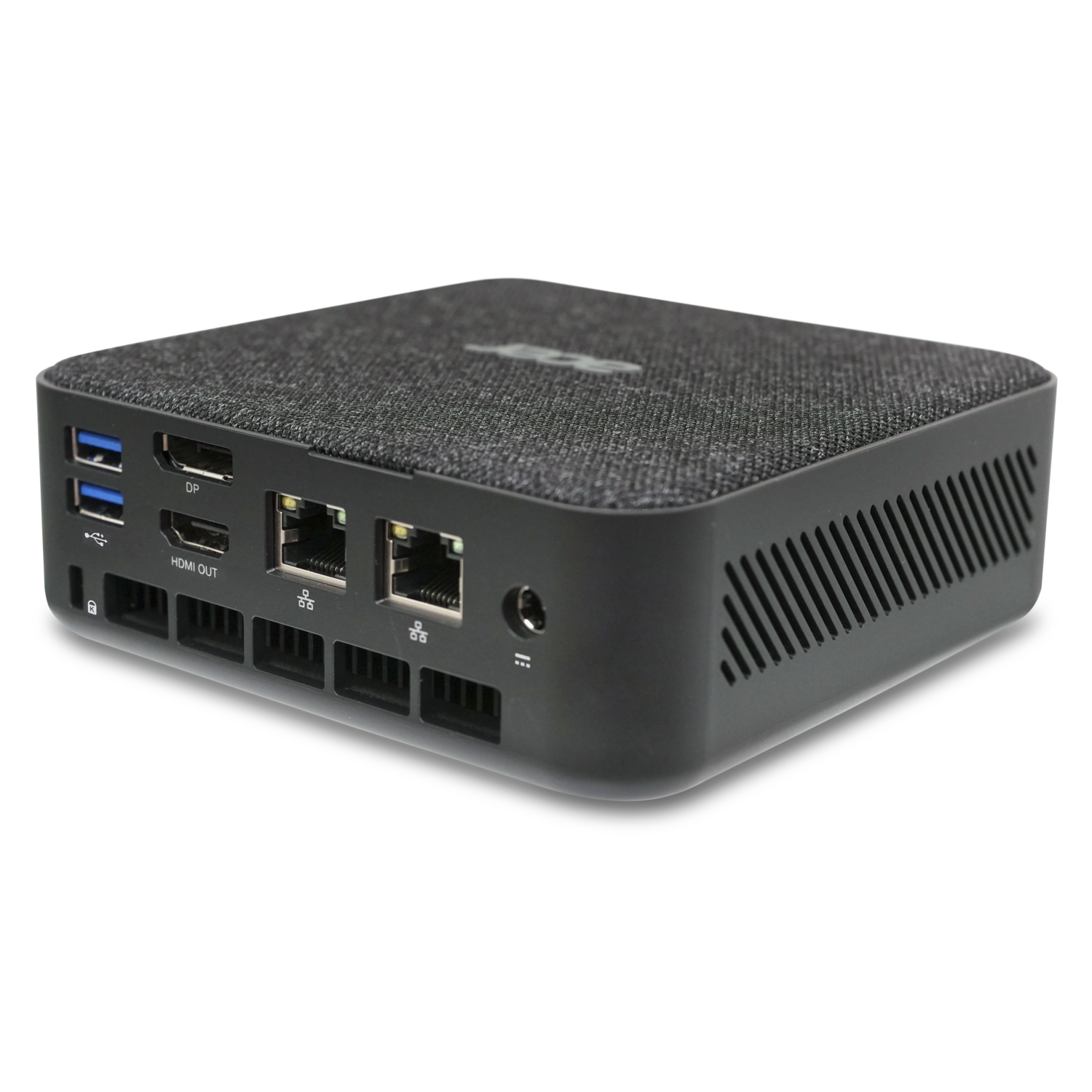 Black mini-PC with ports and vents, viewed from above, on a white surface.