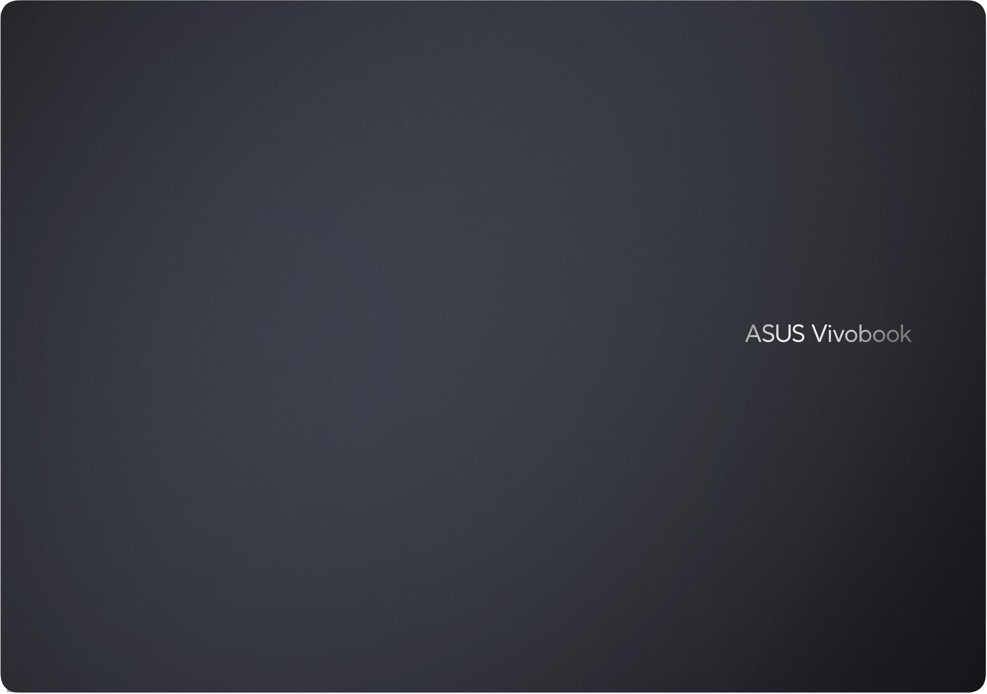 Sötétkék laptop, csukva. 'ASUS Vivobook' felirat a fedélen.