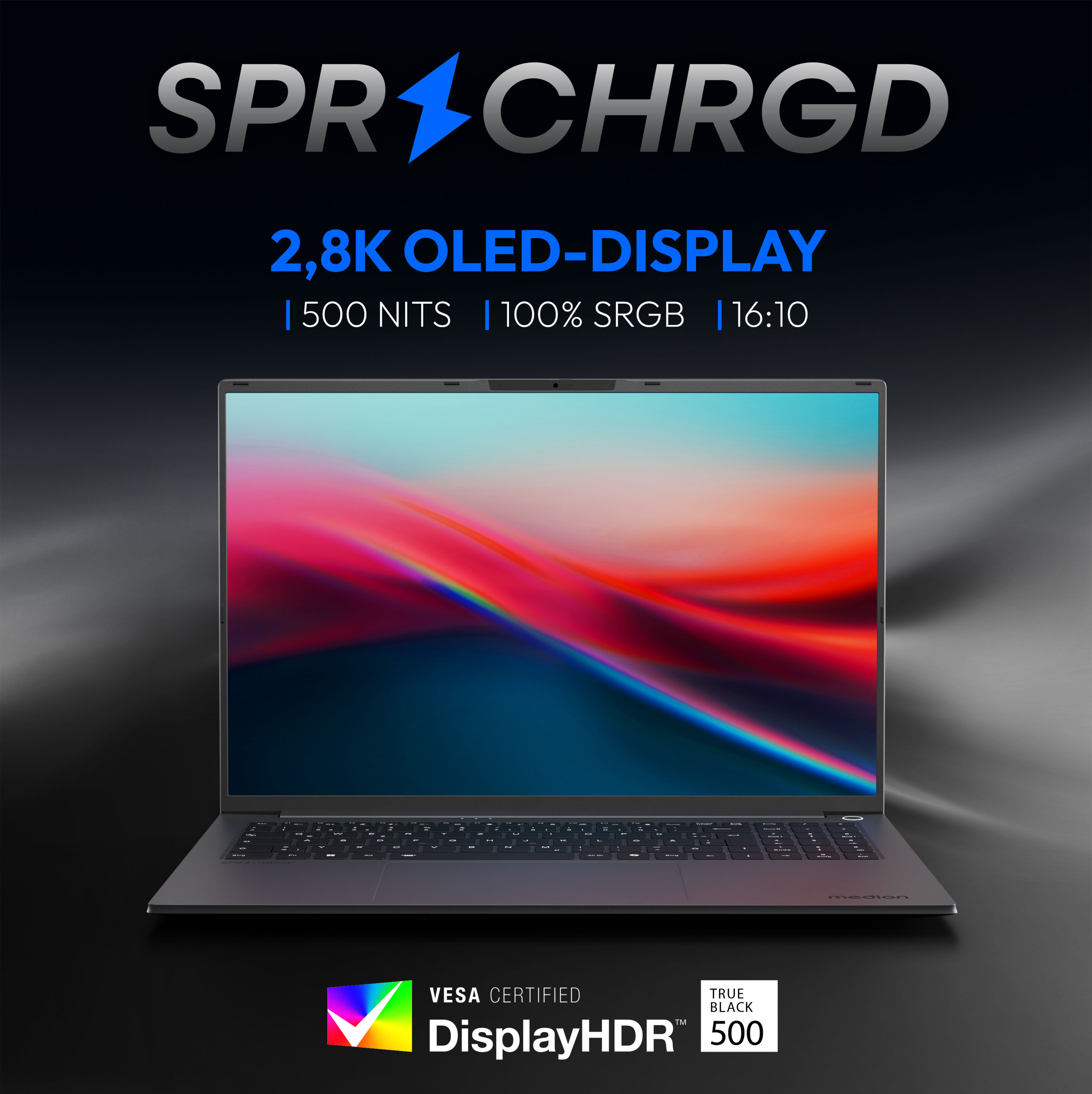 Laptopbildschirm mit farbenfroher abstrakter Kunst. Text oben: 'SPR CHGRD' und Display-Spezifikationen.