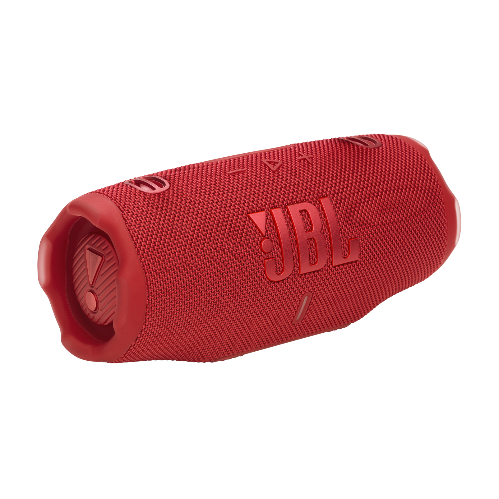 JBL logosu olan kırmızı bir JBL hoparlör açılı olarak siyah bir yüzeyde duruyor.