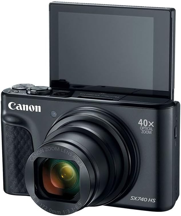 Cámara Canon negra con pantalla abatible, inclinada hacia el espectador.