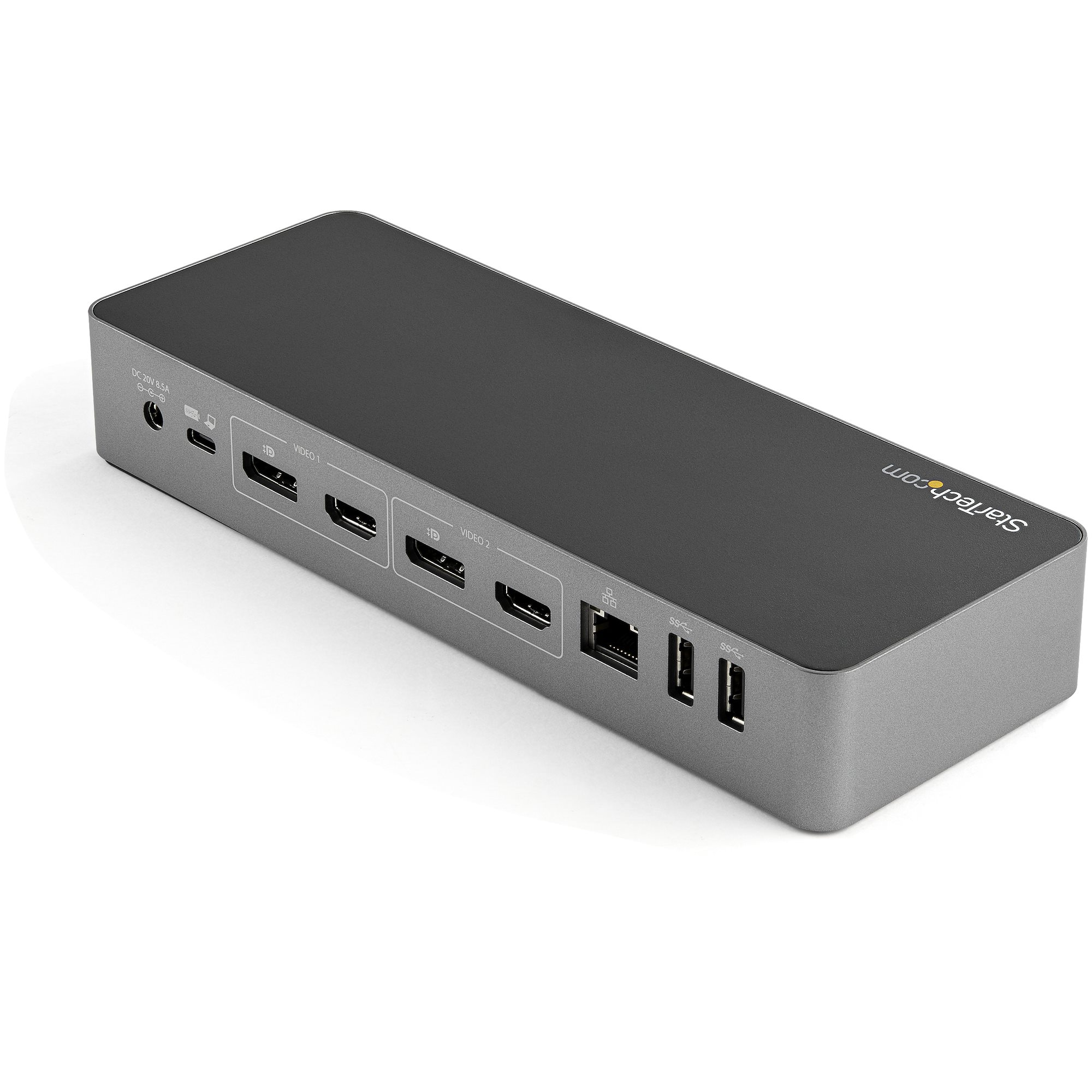 Egy szürke dokkolóállomás több porttal. HDMI, USB és más csatlakozók láthatók.