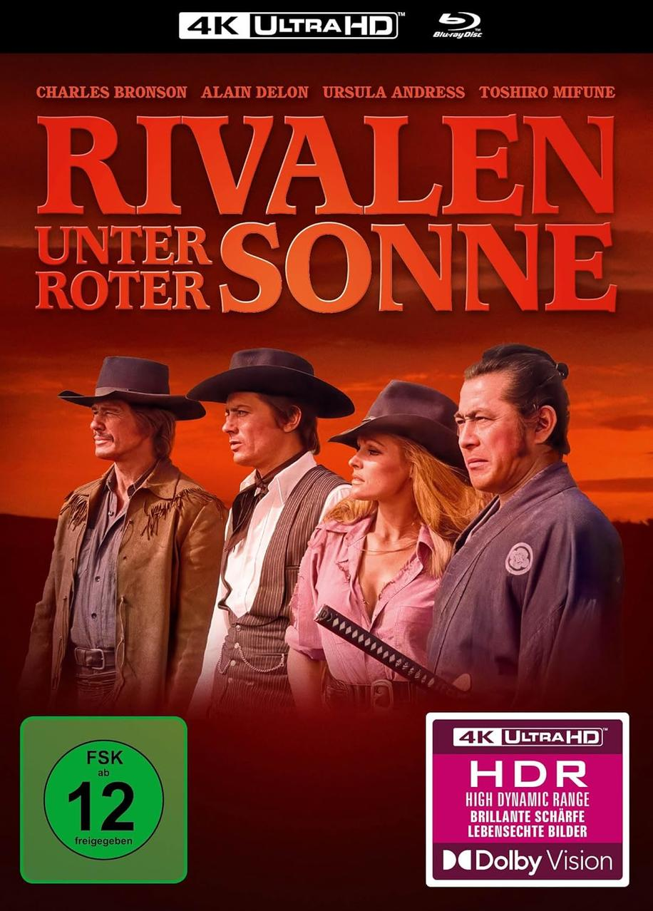 Ein Filmplakat mit vier Männern in Cowboyhüten. Text: 'Rivalen unter Roter Sonne' und Namen der Schauspieler.