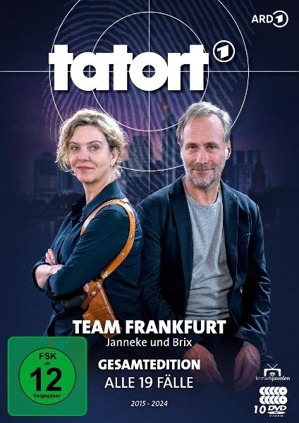 DVD-Cover mit zwei Schauspielern, Titel 'Tatort' und 'Team Frankfurt'. Hintergrund Skyline.