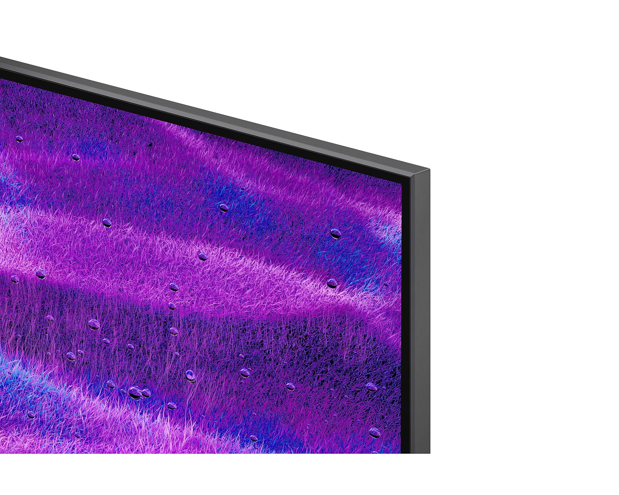 A TV sarok közeli képe, a képernyővel, mely egy színes, absztrakt designt mutat.