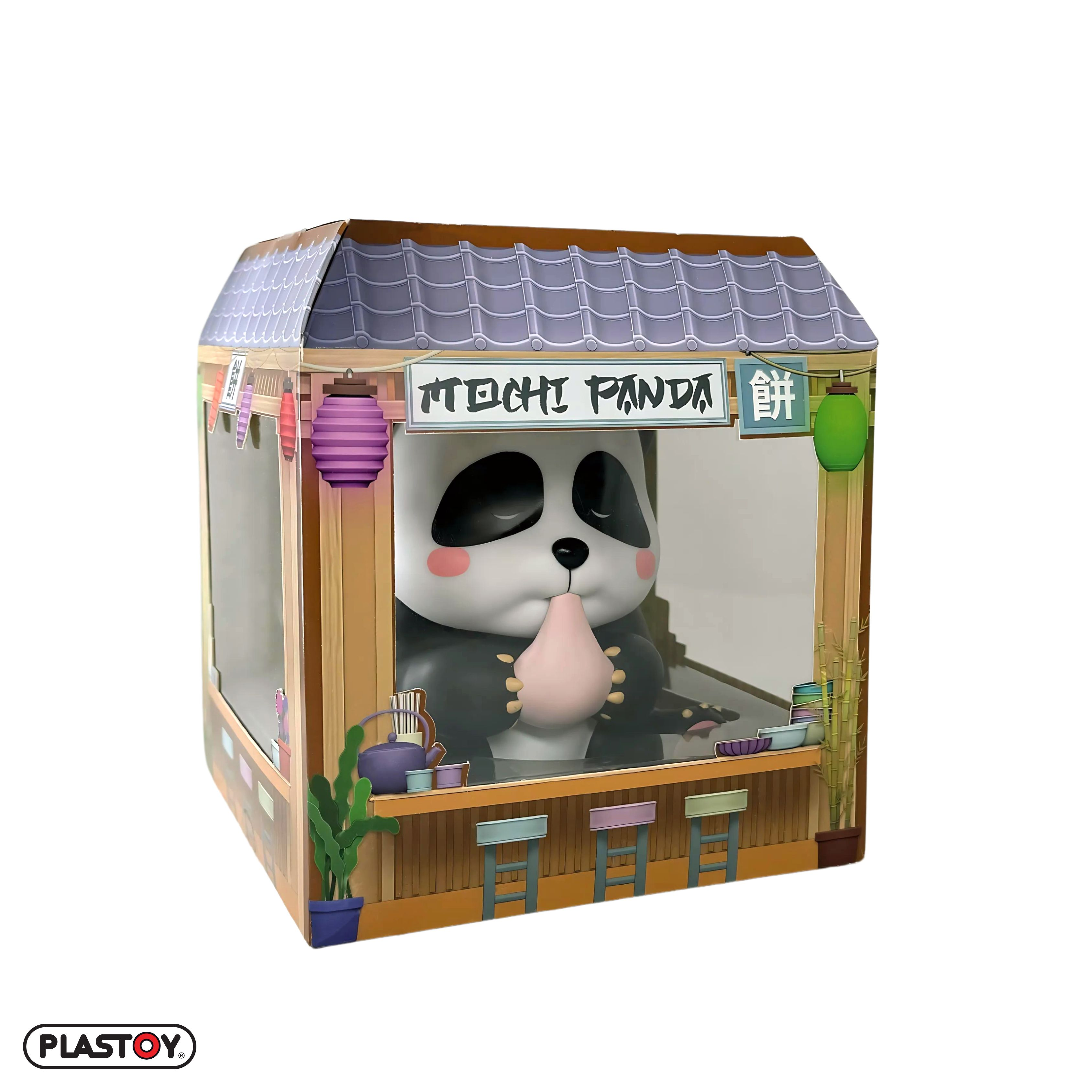 Panda-Figur in einer Schaufenster-Vitrine mit Text und japanischen Schriftzeichen.